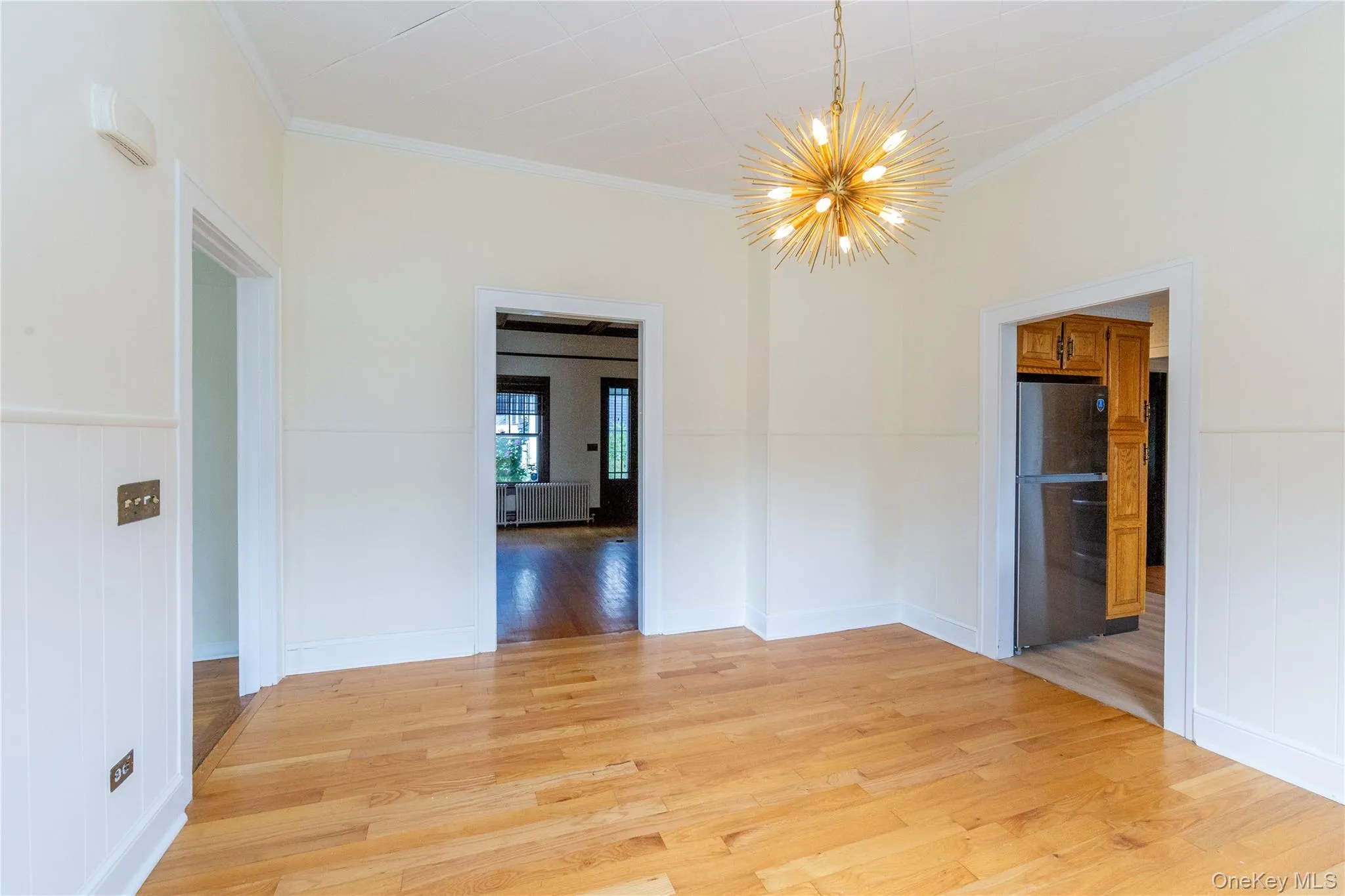 From entry, the door on the left leads to the dining room. From entry, the door on the left leads to the dining room.