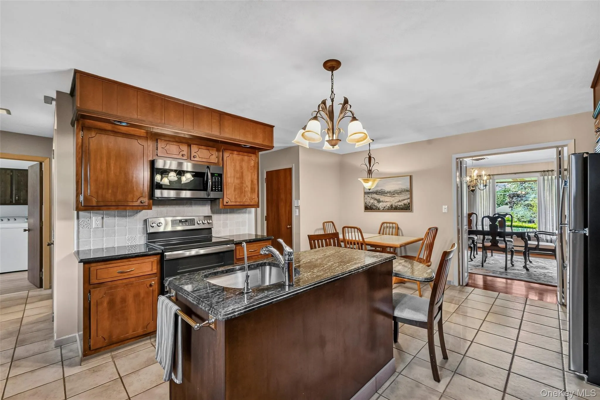 Original walnut cabinets, granite counters, stainless steel appliances Original walnut cabinets, granite counters, stainless steel appliances