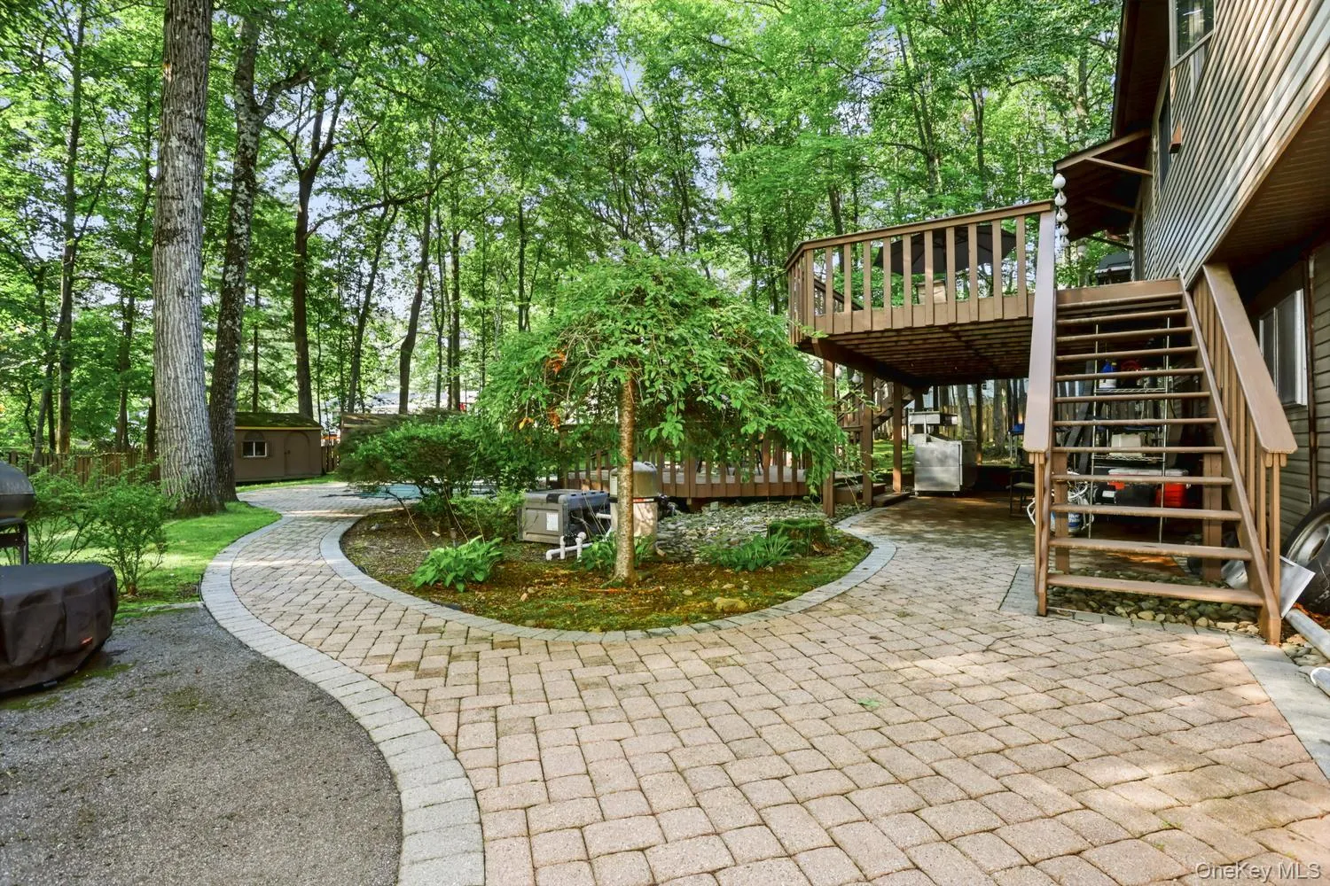 Paver patio with 2 level deck Paver patio with 2 level deck