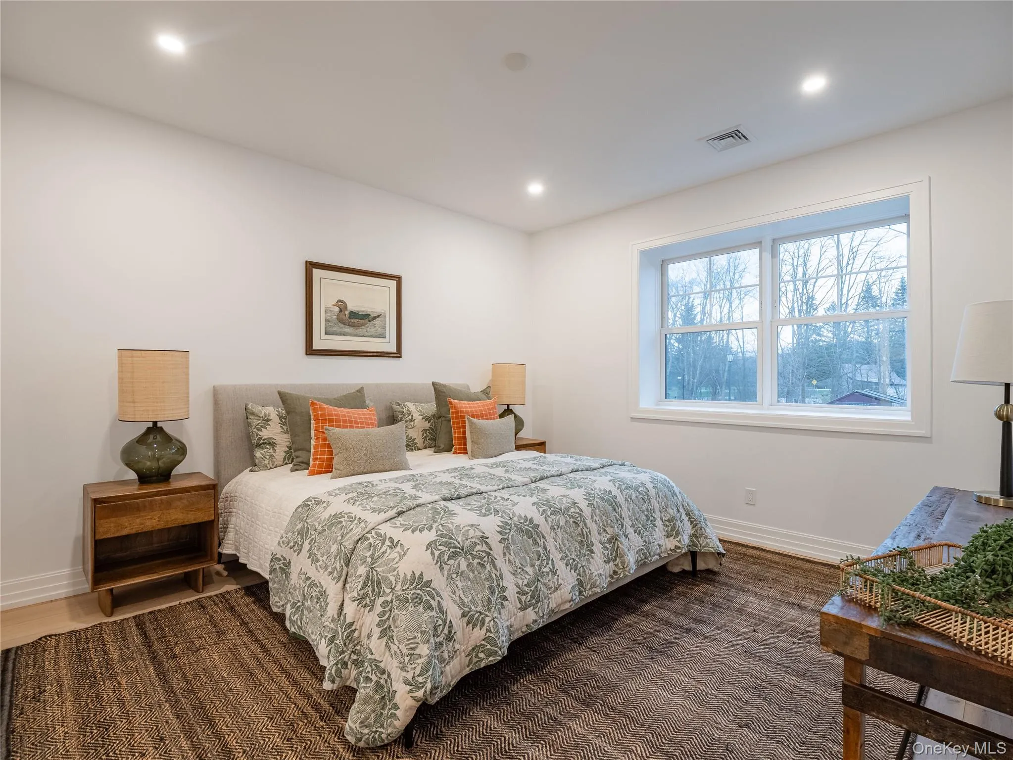 Bedroom featuring baseboards and recessed lighting Bedroom featuring baseboards and recessed lighting