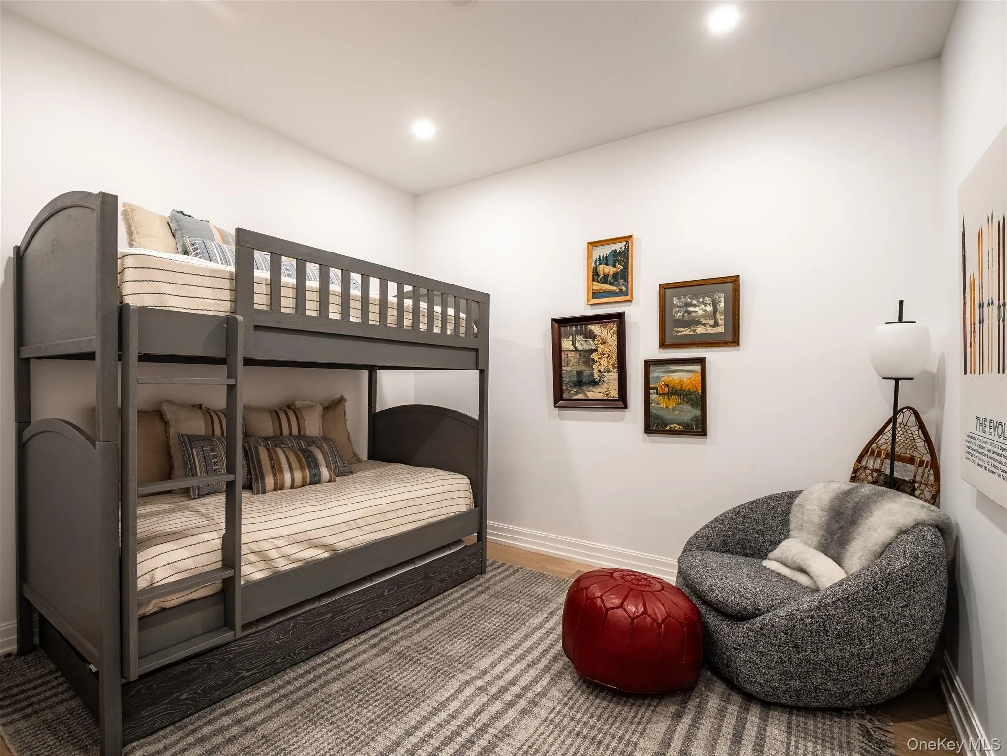 Bedroom with wood finished floors and recessed lighting Bedroom with wood finished floors and recessed lighting