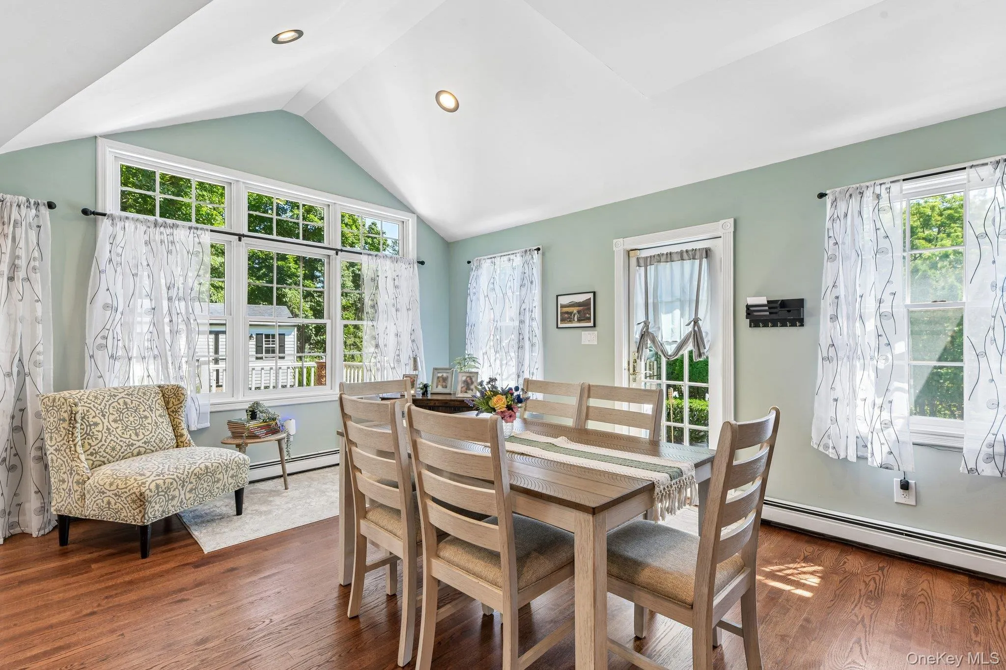 Right off the kitchen is the breakfast area Right off the kitchen is the breakfast area