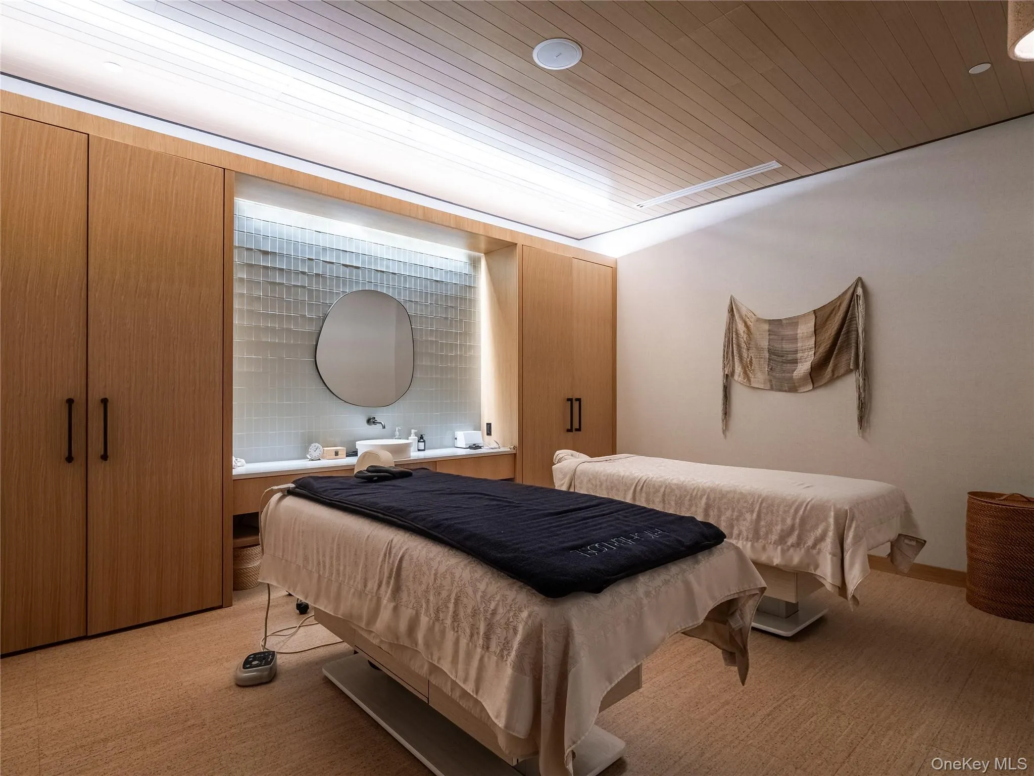 Bedroom with light carpet and wood ceiling Bedroom with light carpet and wood ceiling