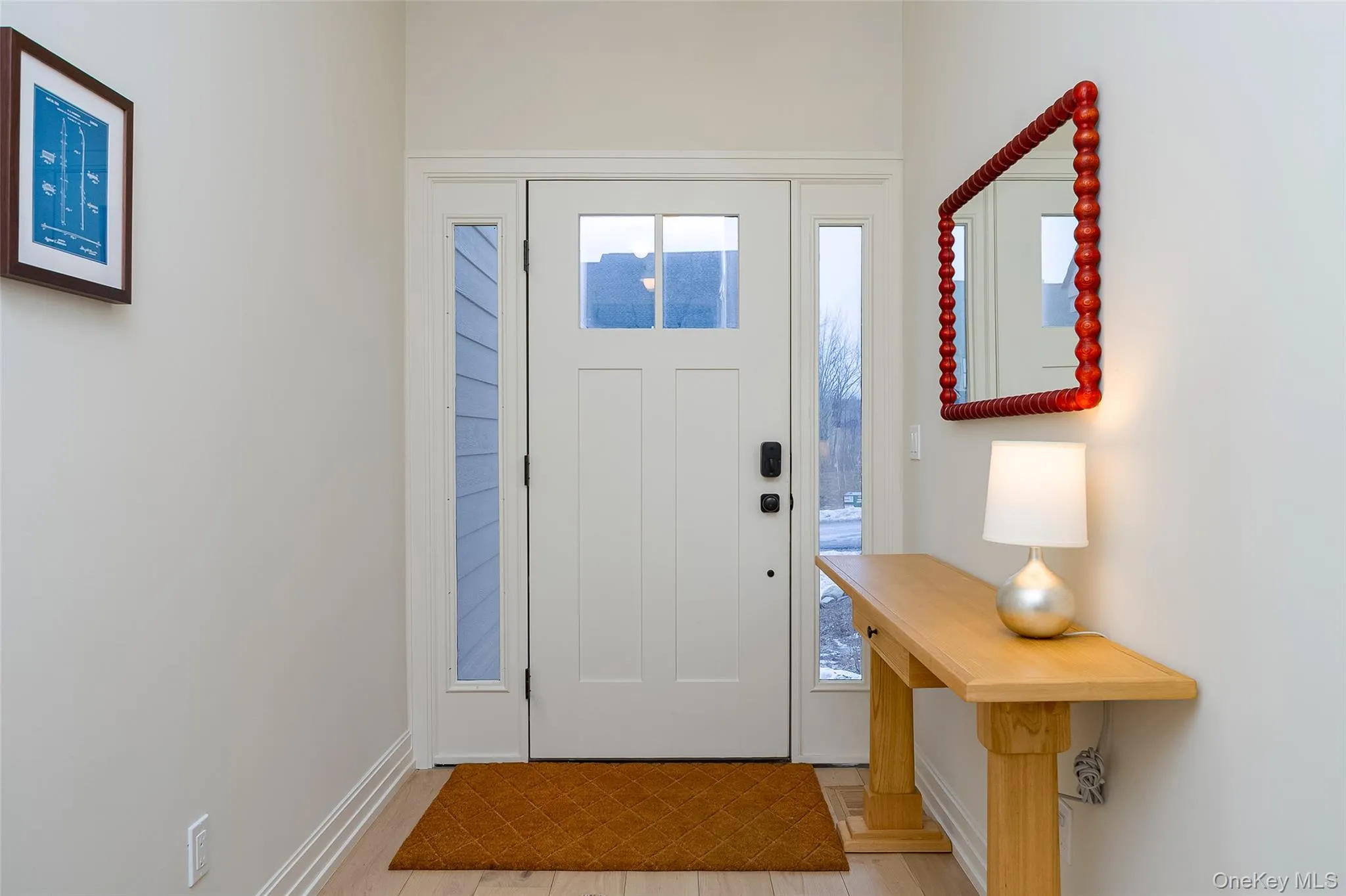 Entrance foyer with baseboards Entrance foyer with baseboards