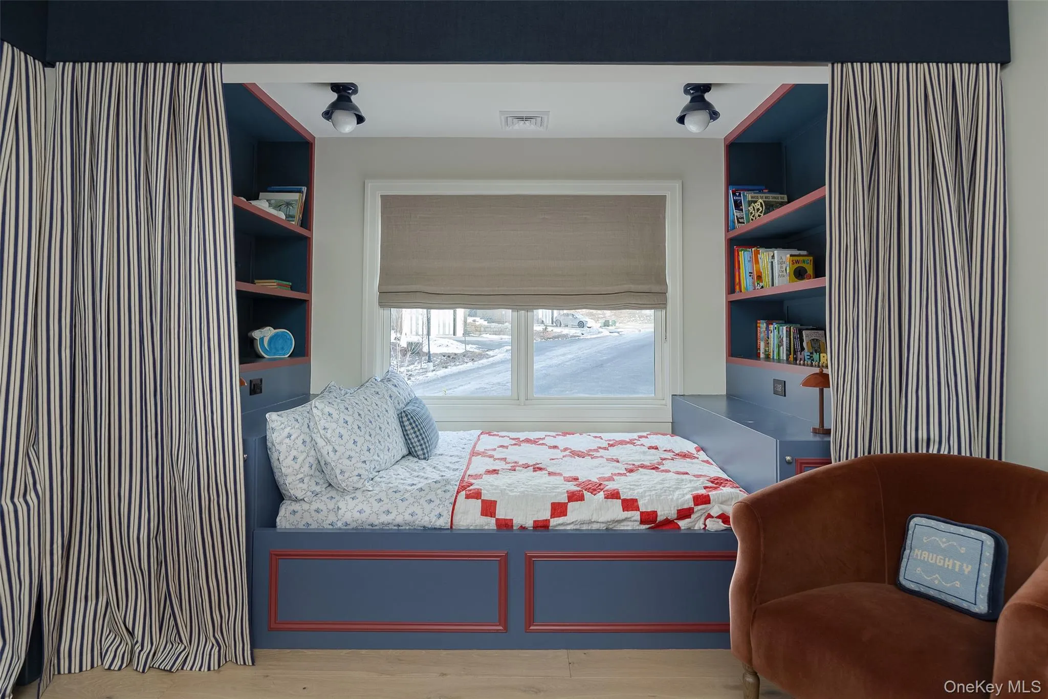 Bedroom featuring light wood-style flooring Bedroom featuring light wood-style flooring