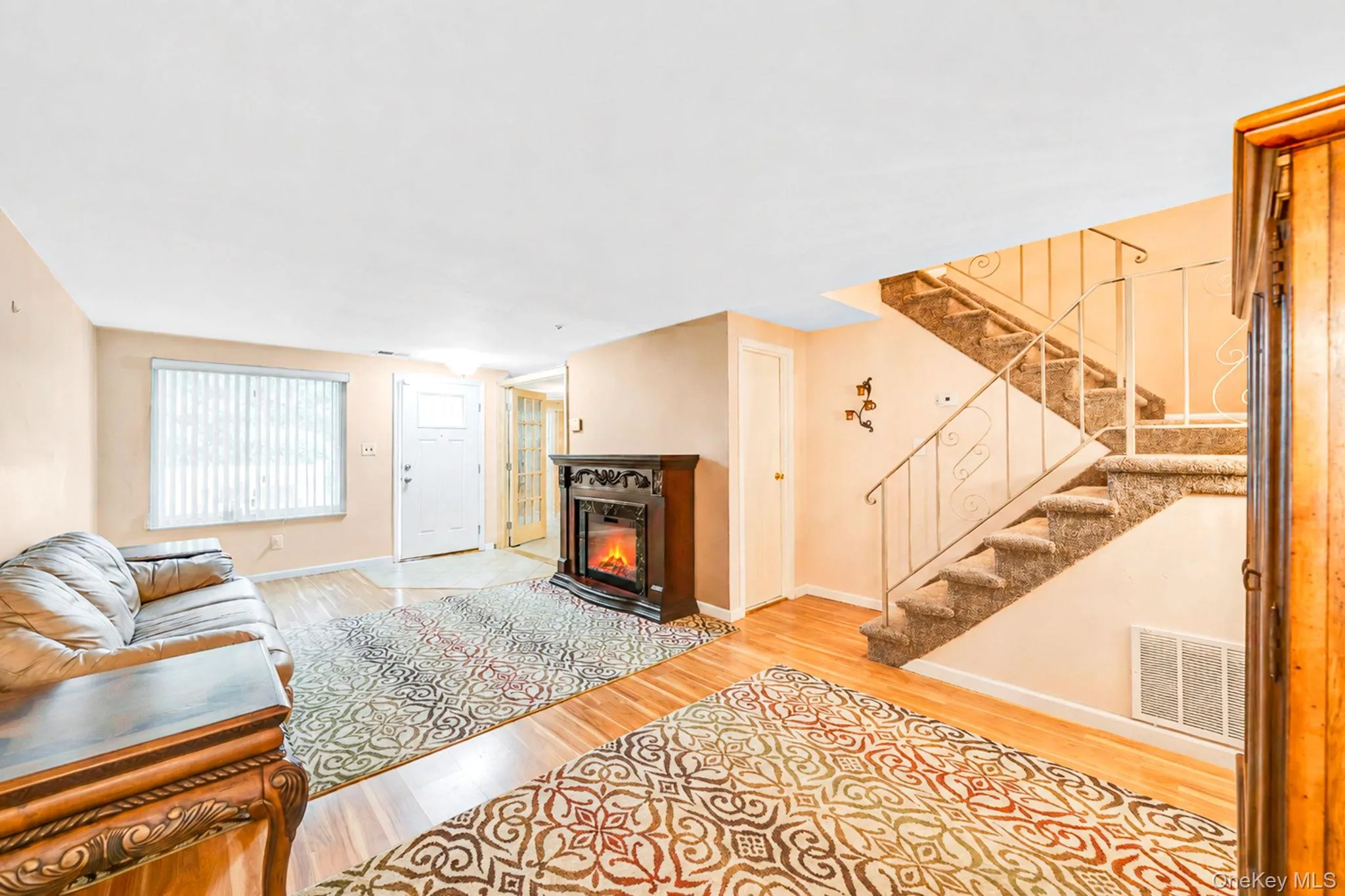main living space with staircase to second floor main living space with staircase to second floor
