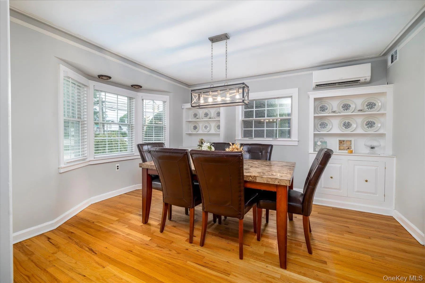 Formal Dining with ductless A/C and built-ins Formal Dining with ductless A/C and built-ins