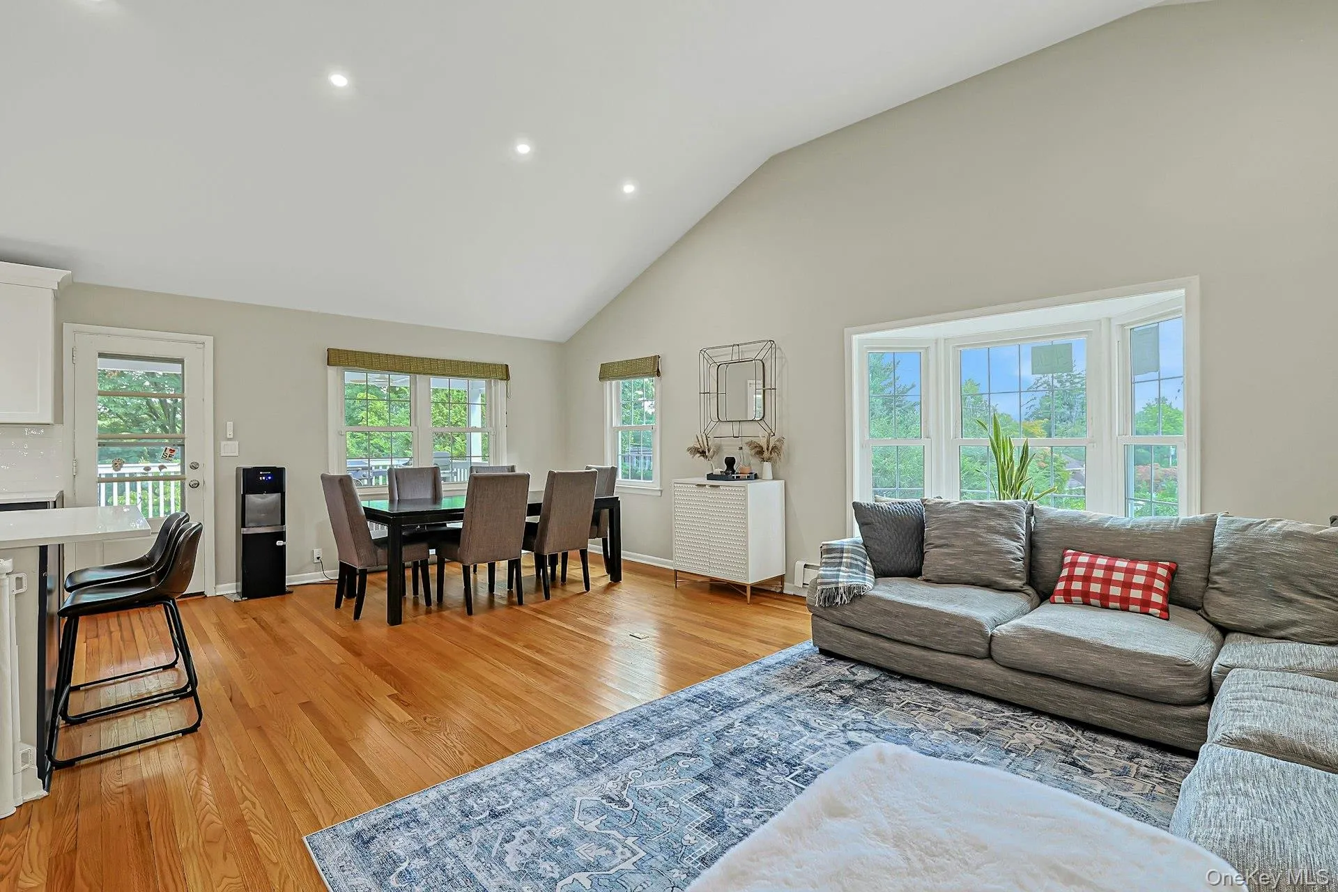 Living to Dining Room with Door to Oversized Deck Living to Dining Room with Door to Oversized Deck