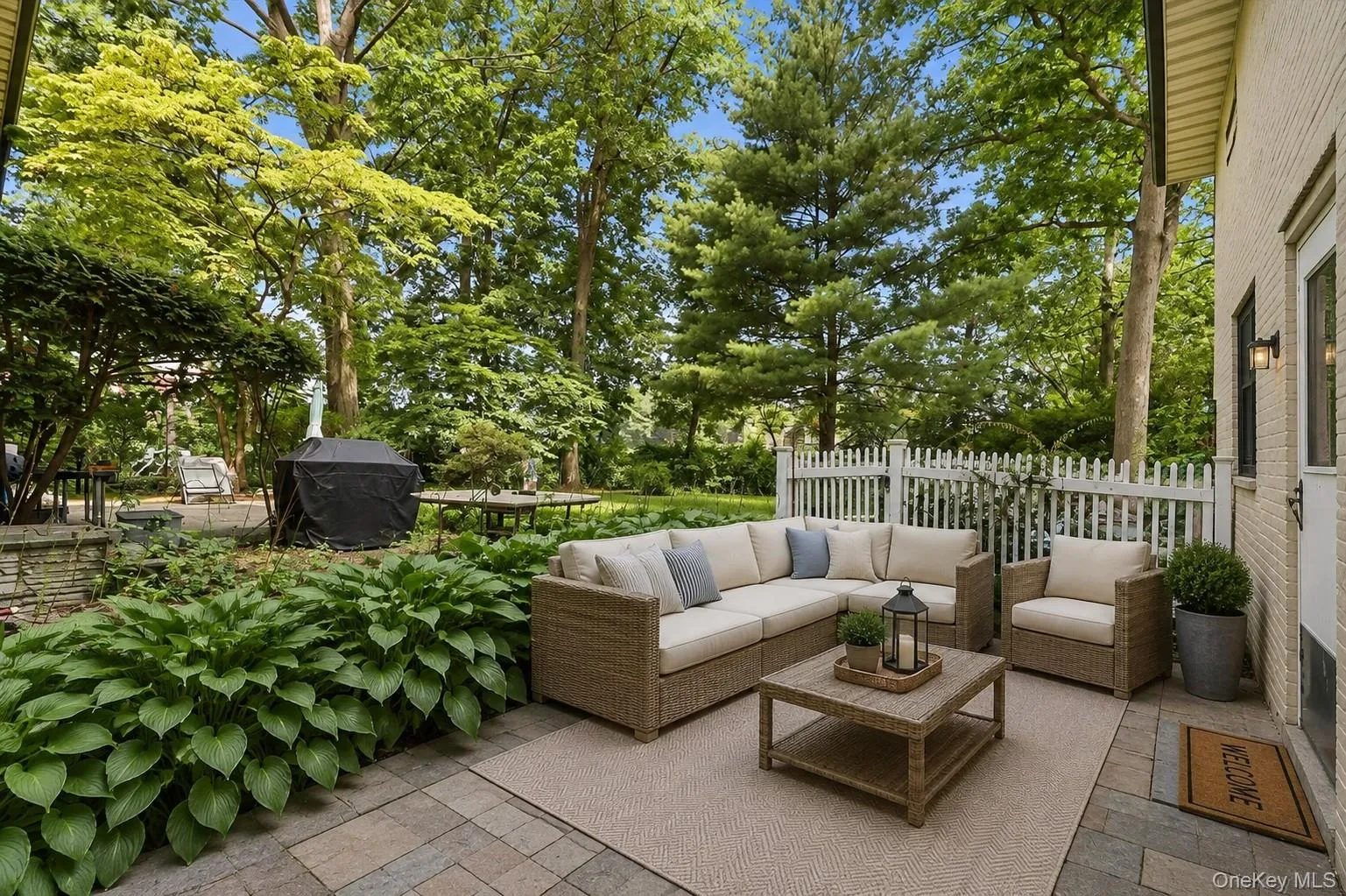 Private Outdoor Patio area / Virtually staged with patio set Private Outdoor Patio area / Virtually staged with patio set