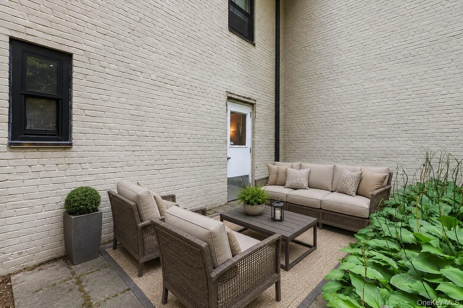 Private Outdoor Patio area / Virtually staged with furnishing Private Outdoor Patio area / Virtually staged with furnishing