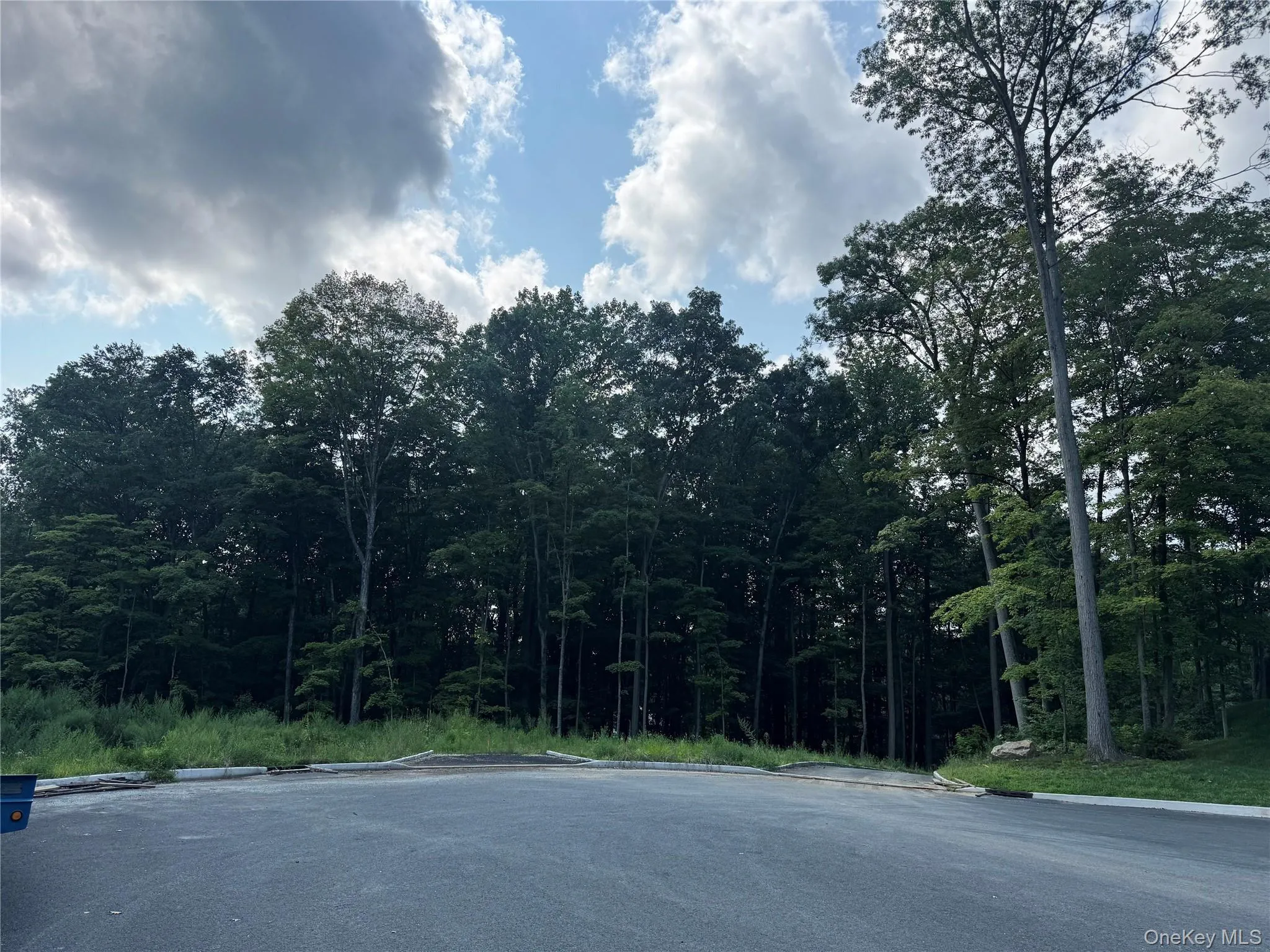 A private road welcomes you into an exclusive four-home cul-de-sac A private road welcomes you into an exclusive four-home cul-de-sac