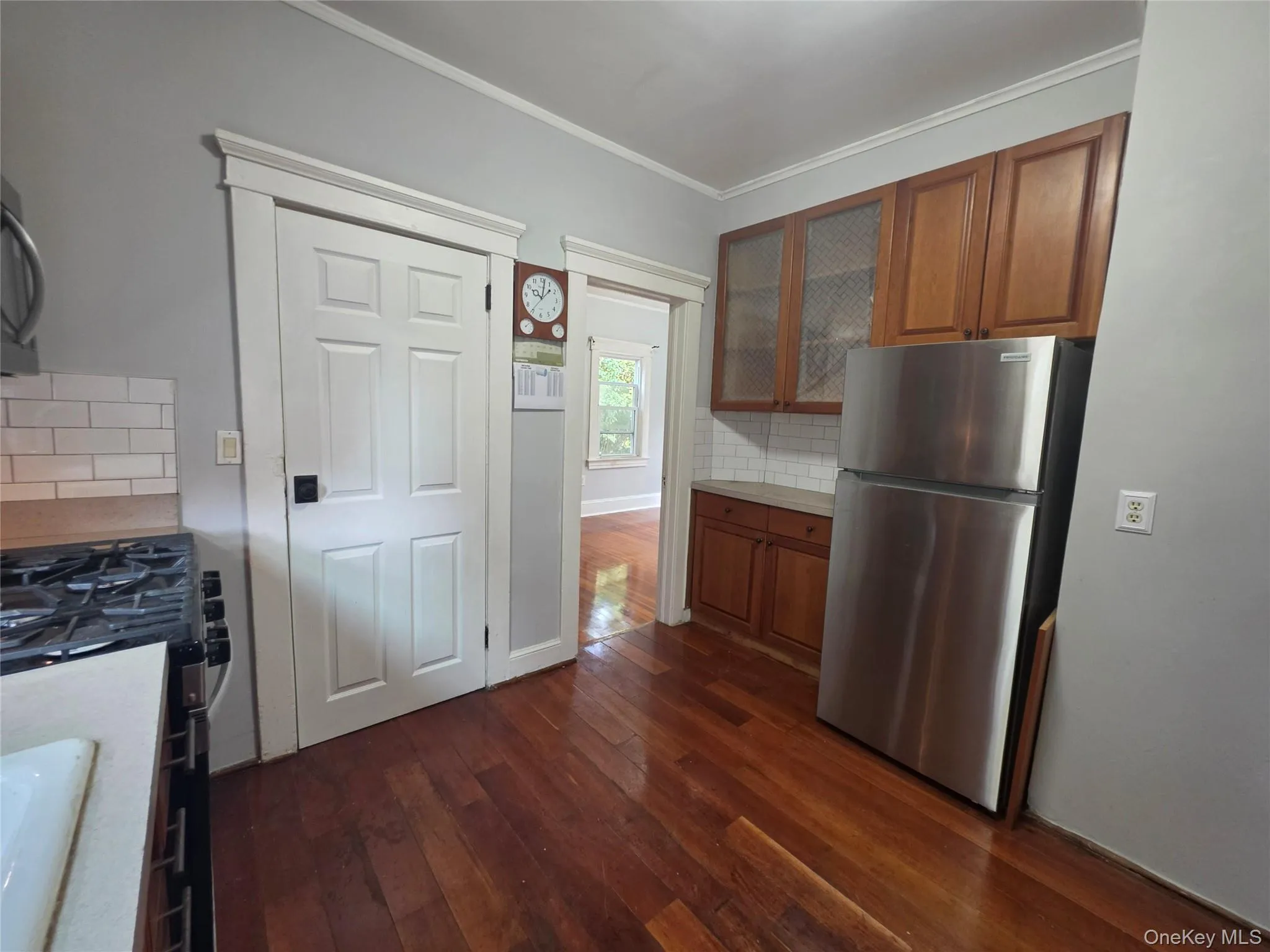 Kitchen door which provides another access to outside of house. Kitchen door which provides another access to outside of house.
