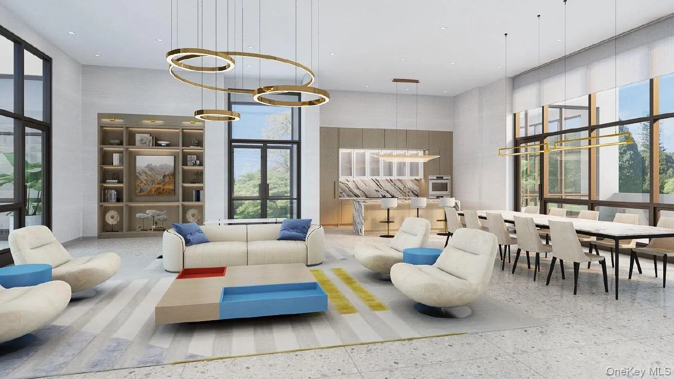 Community lobby with a high ceiling and recessed lighting Community lobby with a high ceiling and recessed lighting