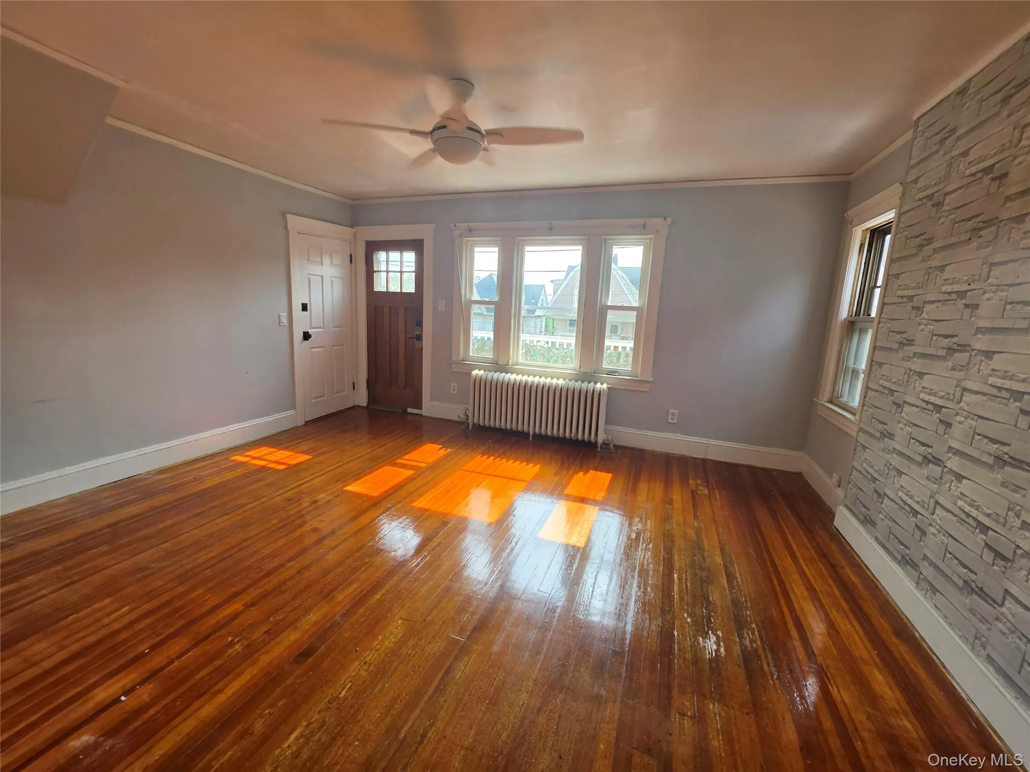Living Room with access to outdoor deck without virtual staging Living Room with access to outdoor deck without virtual staging