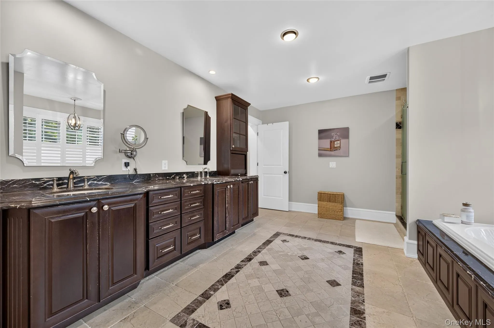 Oversized Primary Bath, custom marble floors, double vanity, tub & shower Oversized Primary Bath, custom marble floors, double vanity, tub & shower