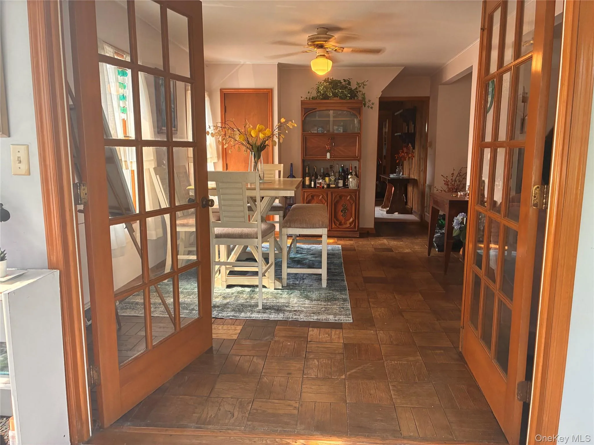 Wood-finish flooring throughout, with a solid wood entry door featuring sidelight windows Wood-finish flooring throughout, with a solid wood entry door featuring sidelight windows