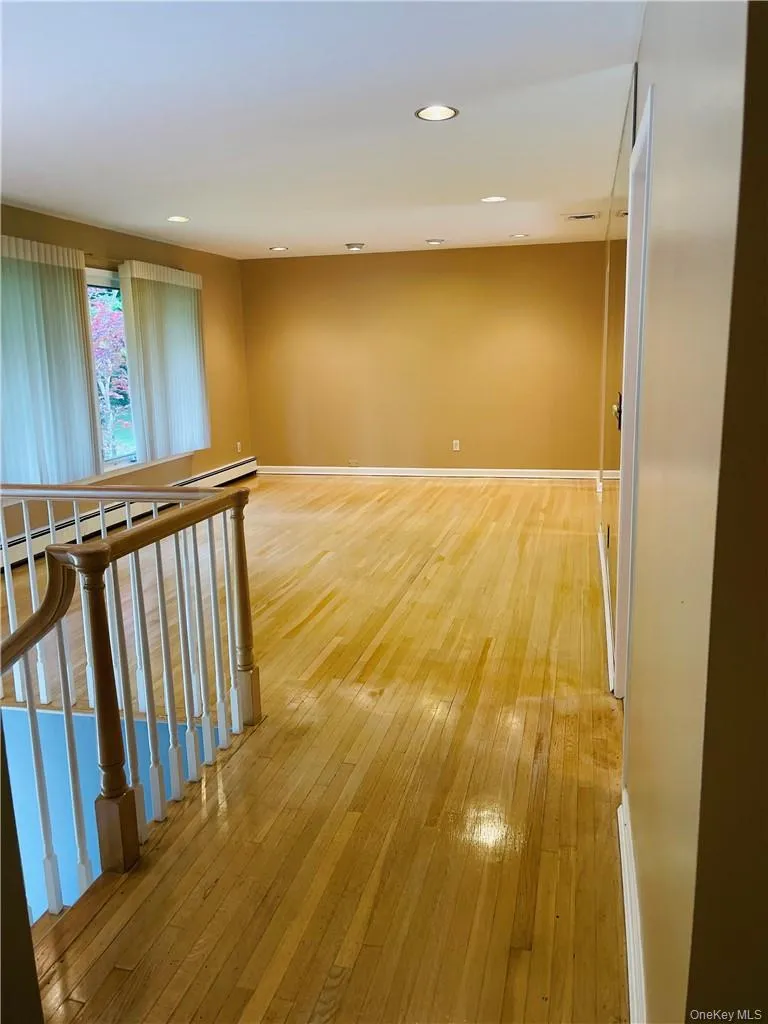 Living room with freshly polyurethaned wood floors Living room with freshly polyurethaned wood floors