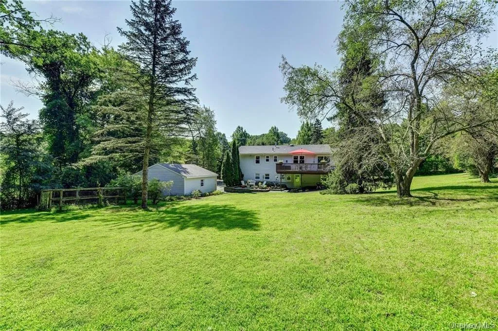 Very large backyard fully fenced in. Very large backyard fully fenced in.