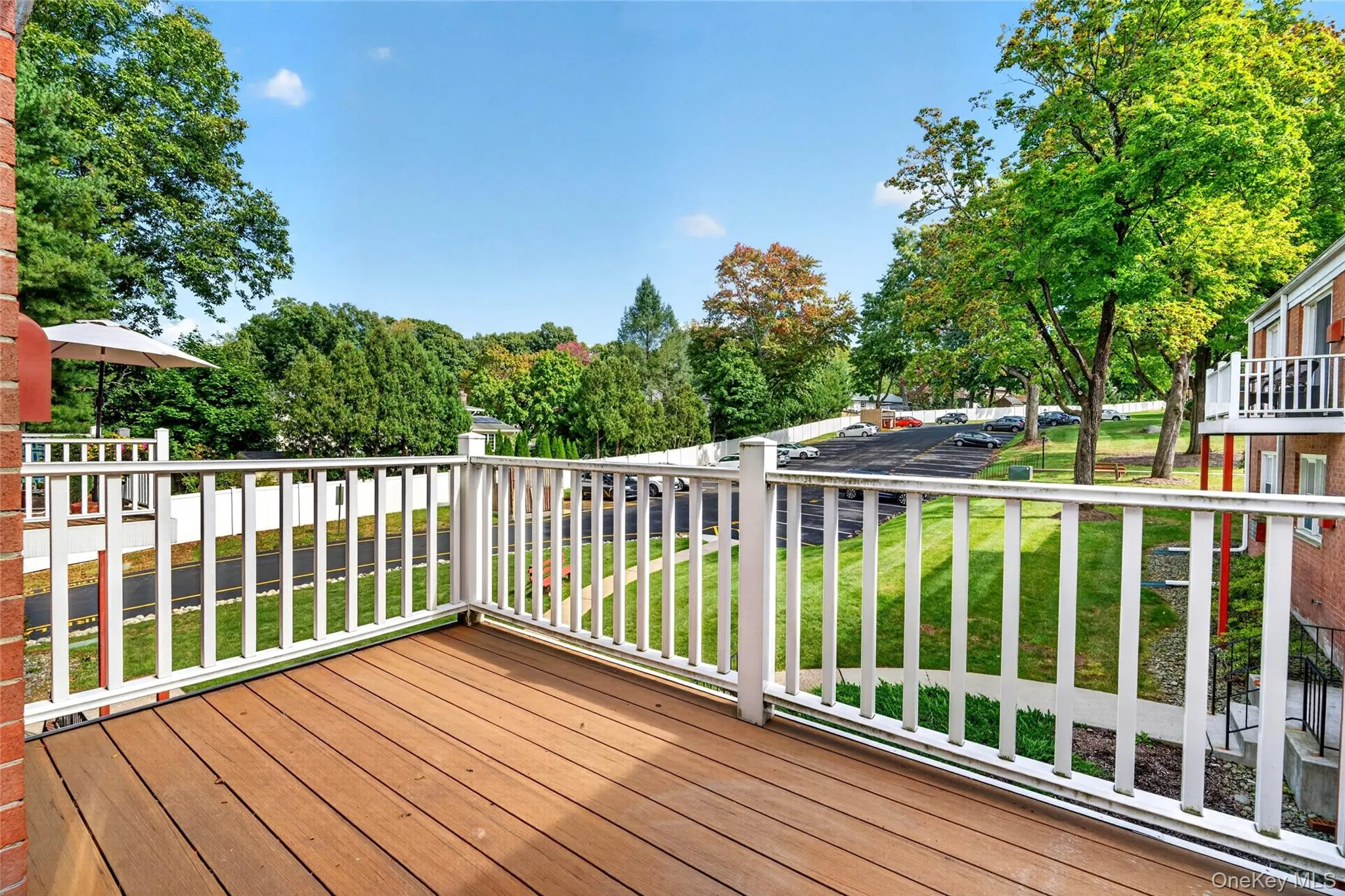private balcony overlooking front yard private balcony overlooking front yard