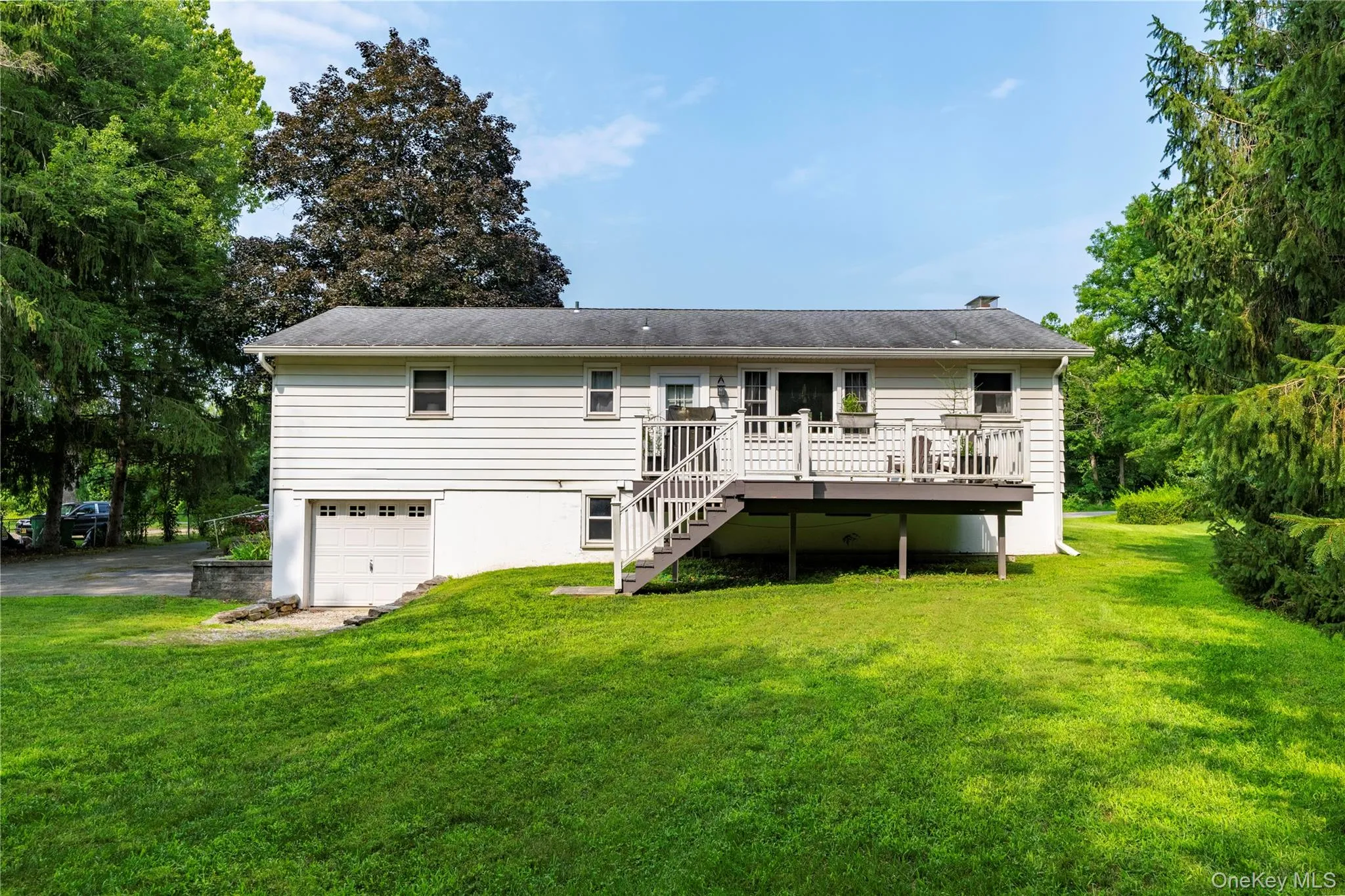 Nice backyard with deck and rear facing garage Nice backyard with deck and rear facing garage
