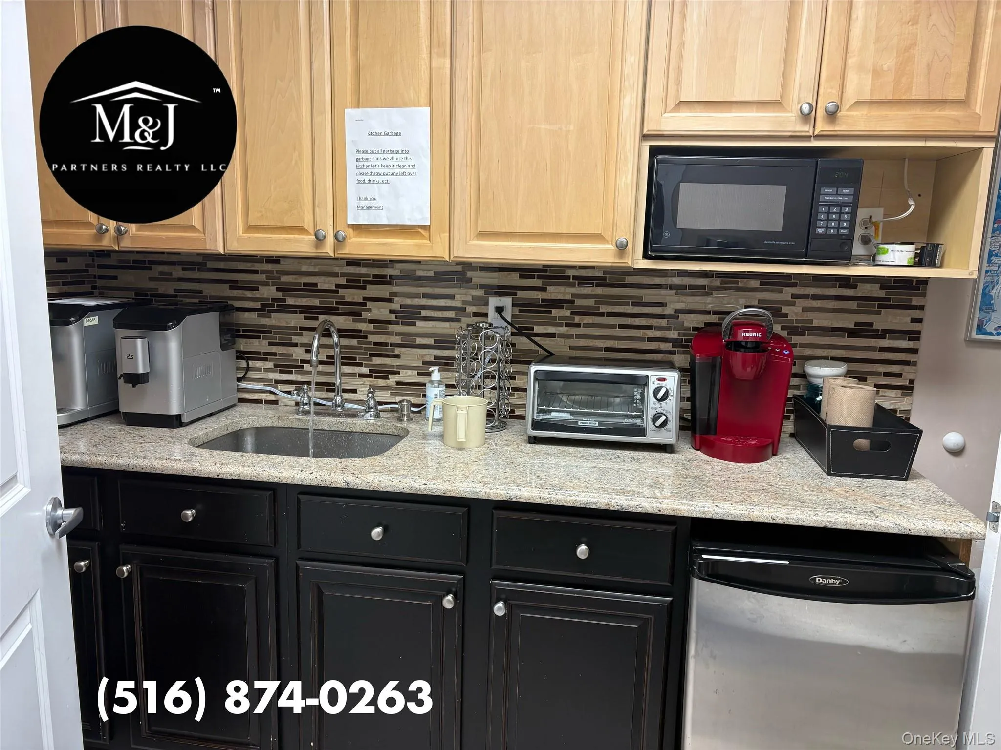 Pantry with sink, refrigerator, coffee machines and microwave. Pantry with sink, refrigerator, coffee machines and microwave.