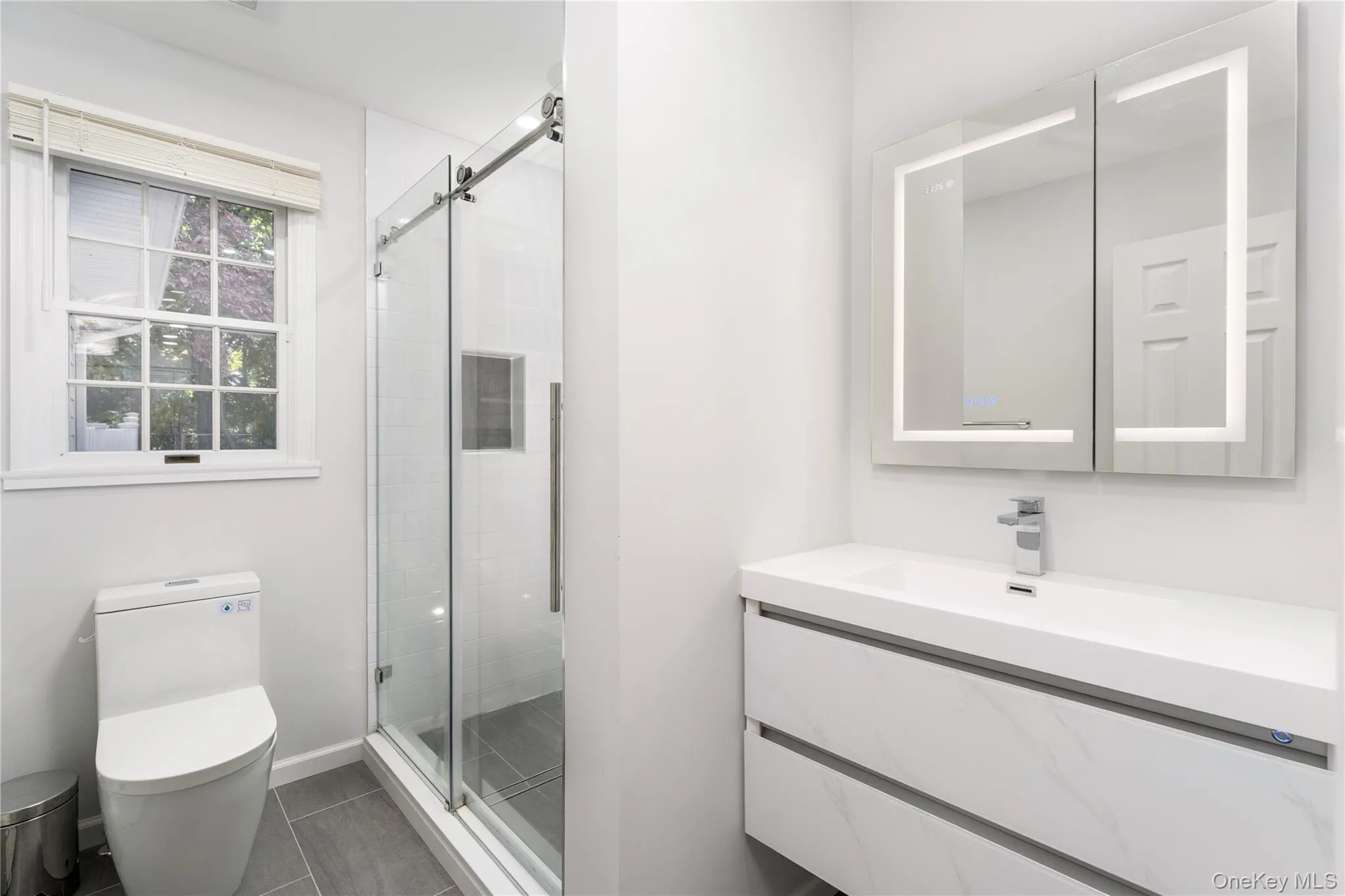 Guest Suite bathroom, LED vanity mirror, walk-in shower Guest Suite bathroom, LED vanity mirror, walk-in shower