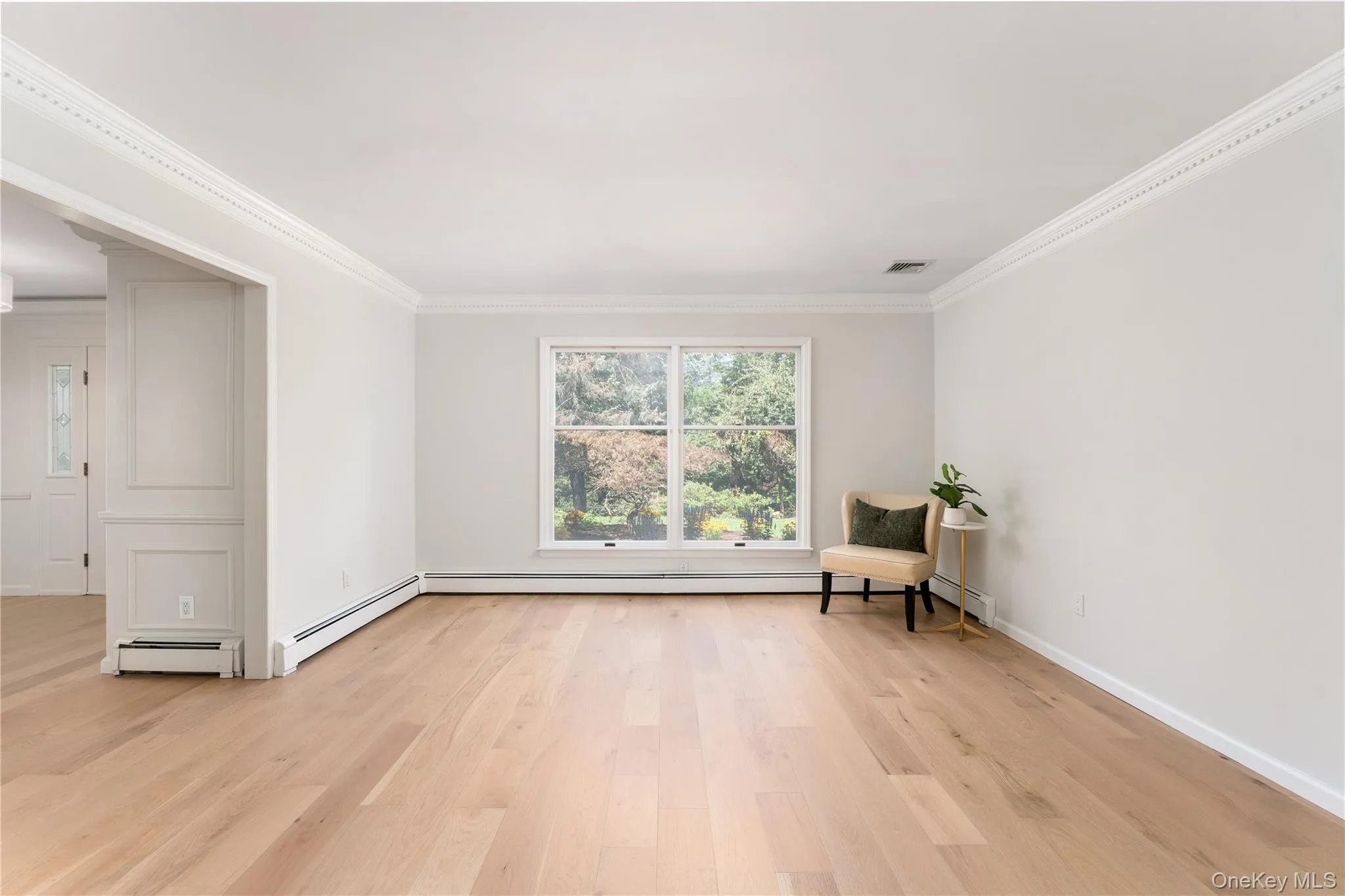 New flooring, fresh neutral paint, crown moulding, oversized Andersen windows New flooring, fresh neutral paint, crown moulding, oversized Andersen windows