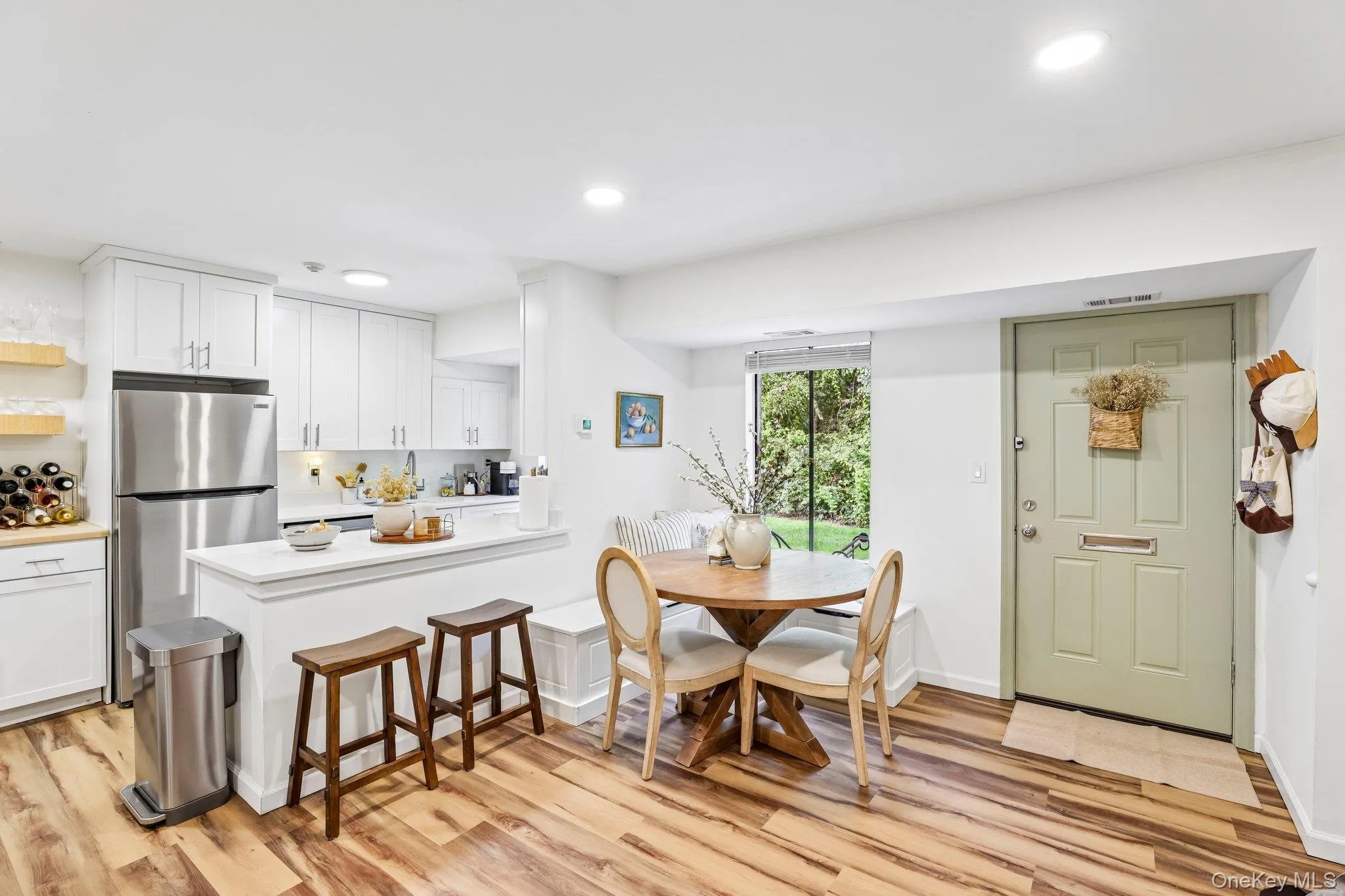 Upon entering, you're welcomed by an abundance of natural light that fills this classic, inviting space. Upon entering, you're welcomed by an abundance of natural light that fills this classic, inviting space.
