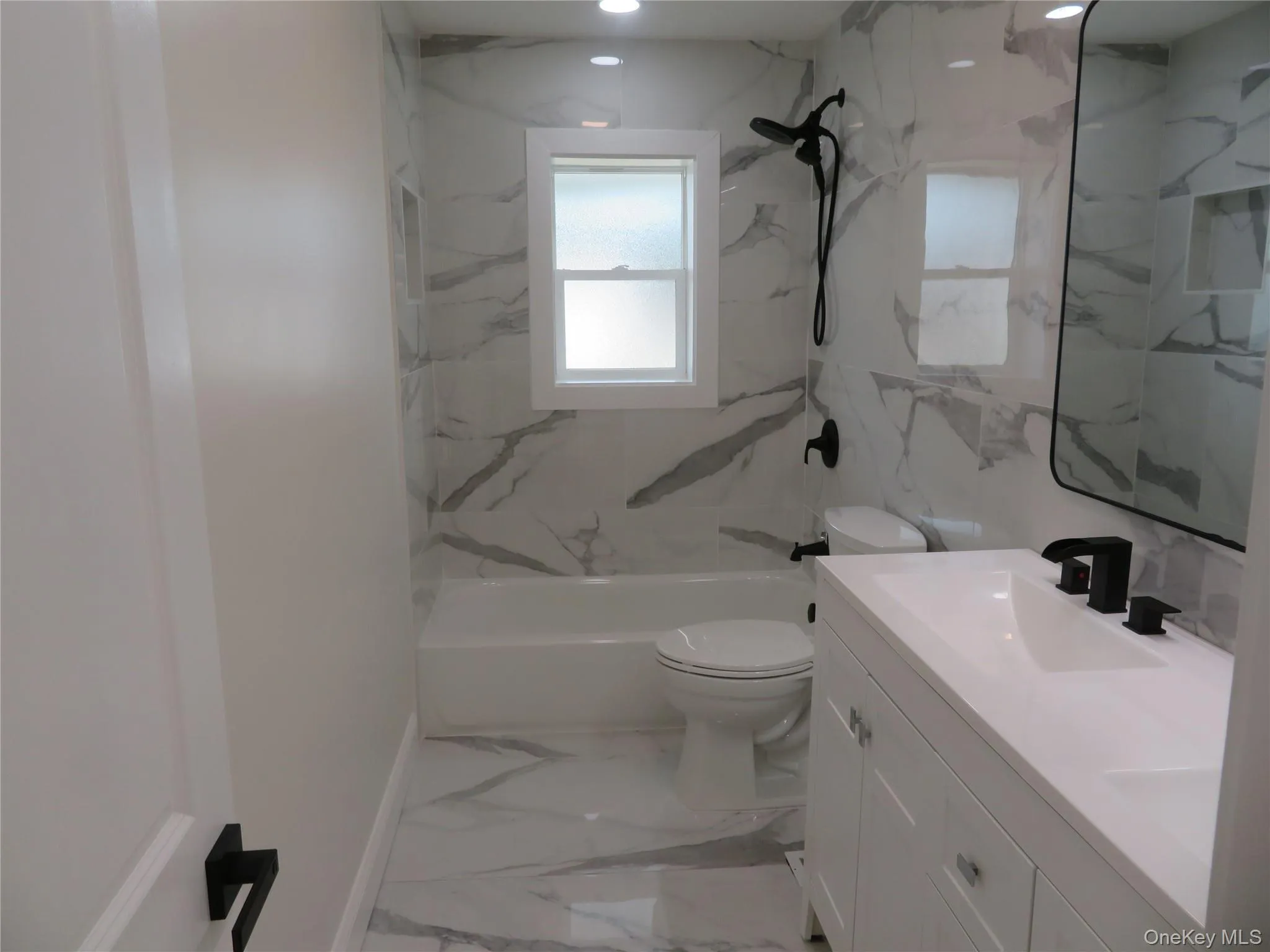 3rd floor hallway bath with double sink. 3rd floor hallway bath with double sink.