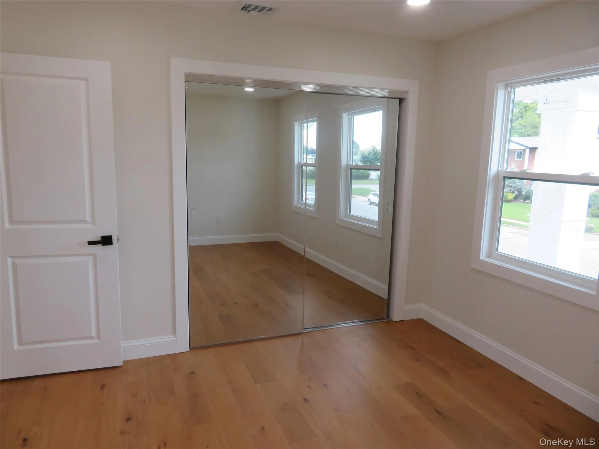 3rd Bedroom on 3rd floor with Mirrored doors in closet 3rd Bedroom on 3rd floor with Mirrored doors in closet