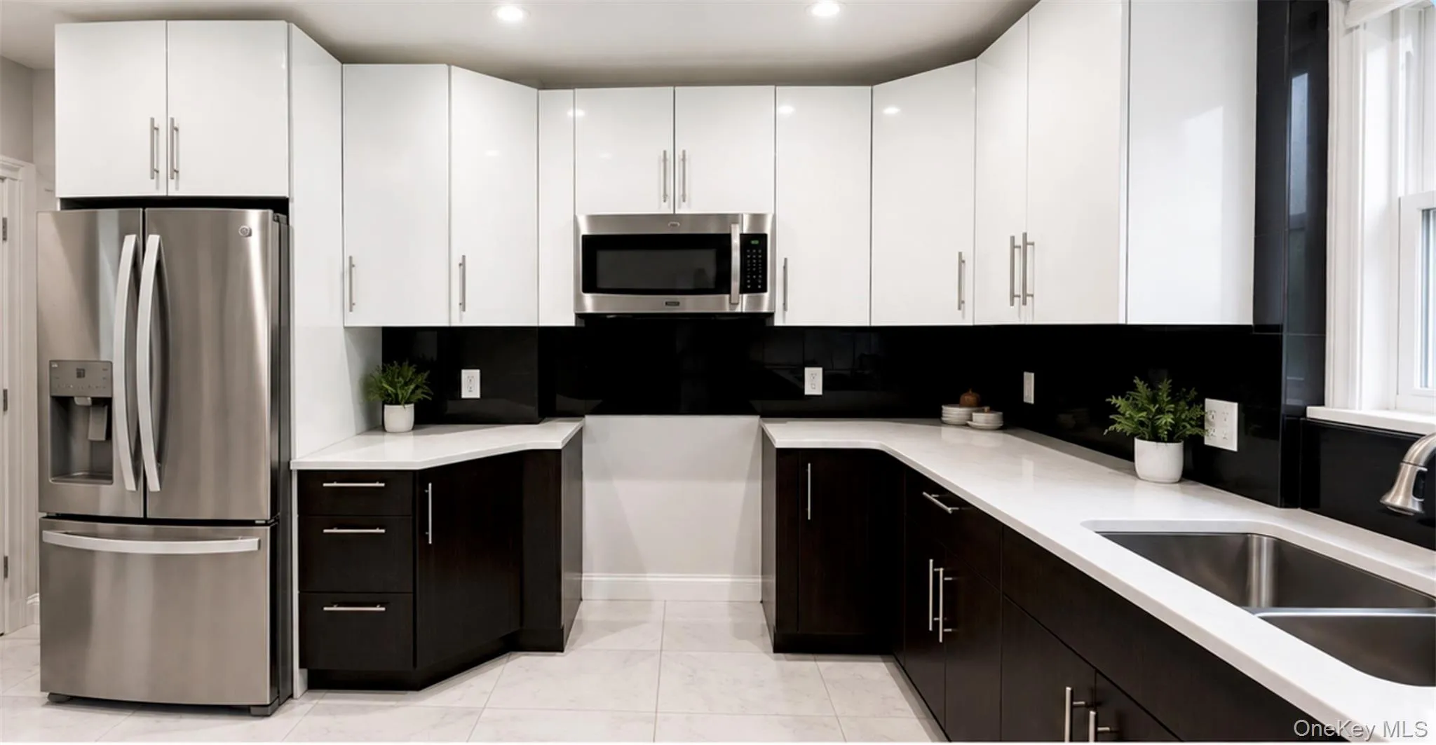 Marble Counter tops with Updated Cabinets. Stove is also included. Marble Counter tops with Updated Cabinets. Stove is also included.