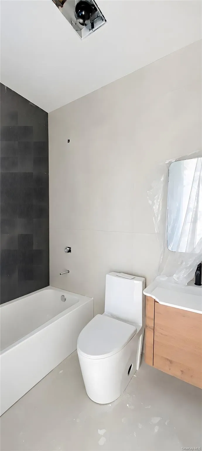 Full white porcelain bathtub with chrome fixtures Full white porcelain bathtub with chrome fixtures