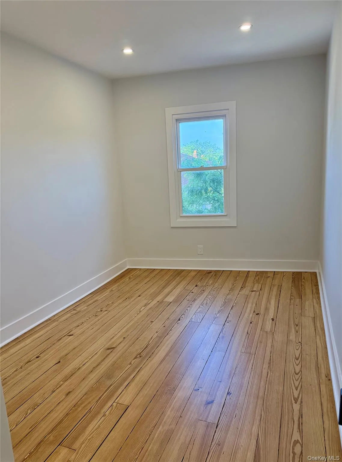 Bright first bedroom appointed with dedicated closet Bright first bedroom appointed with dedicated closet