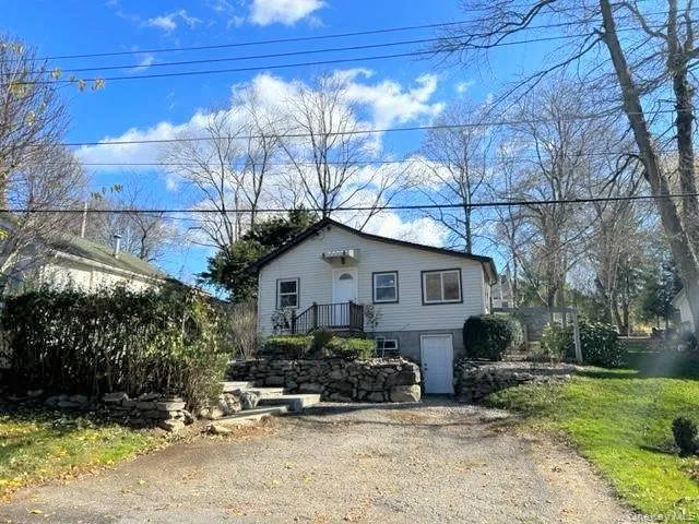 Plenty of Off-Street Parking. Lower door to Laundry & Storage Plenty of Off-Street Parking. Lower door to Laundry & Storage