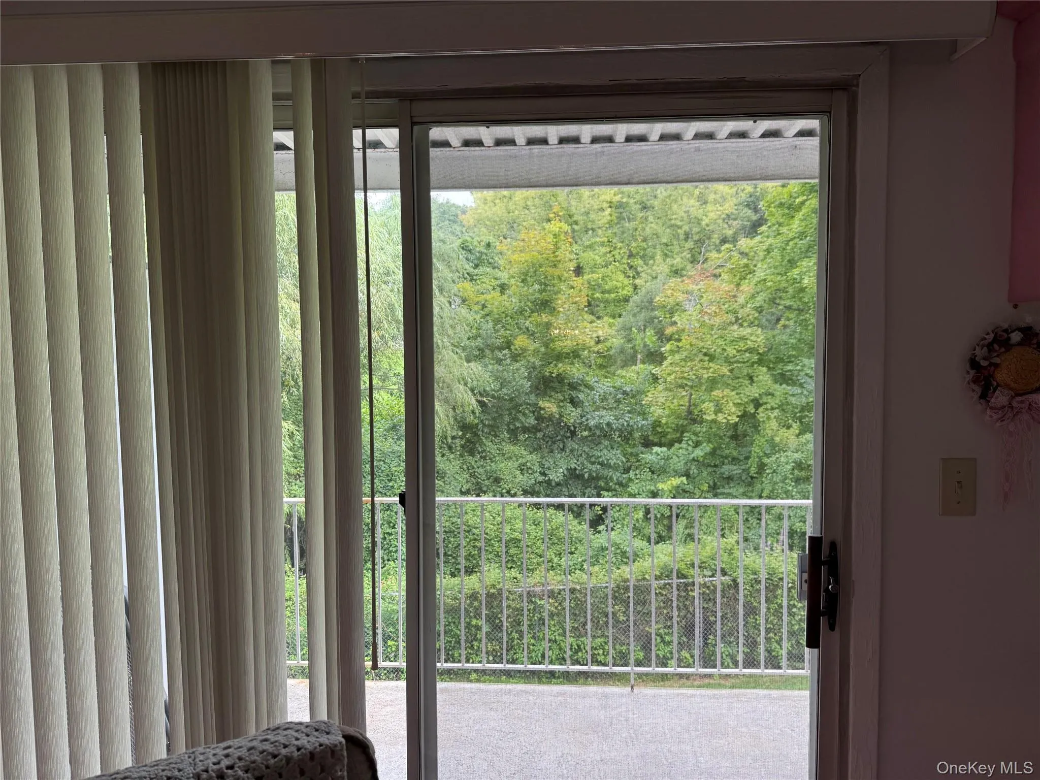 Sliding Living Room doors to balcony with beautiful nature views Sliding Living Room doors to balcony with beautiful nature views