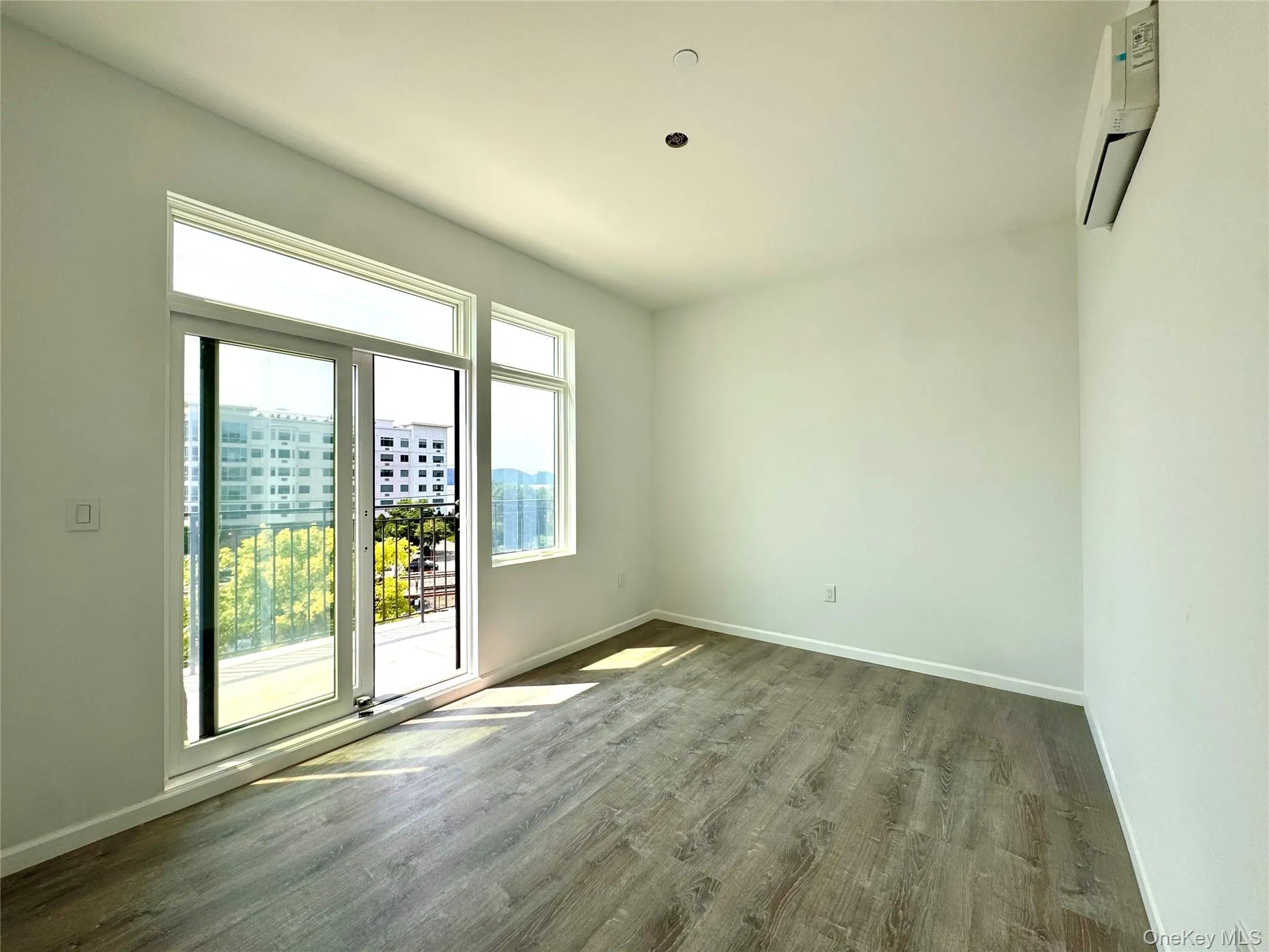 Primary Bedroom has SGD to Balcony and ductless AC unit Primary Bedroom has SGD to Balcony and ductless AC unit