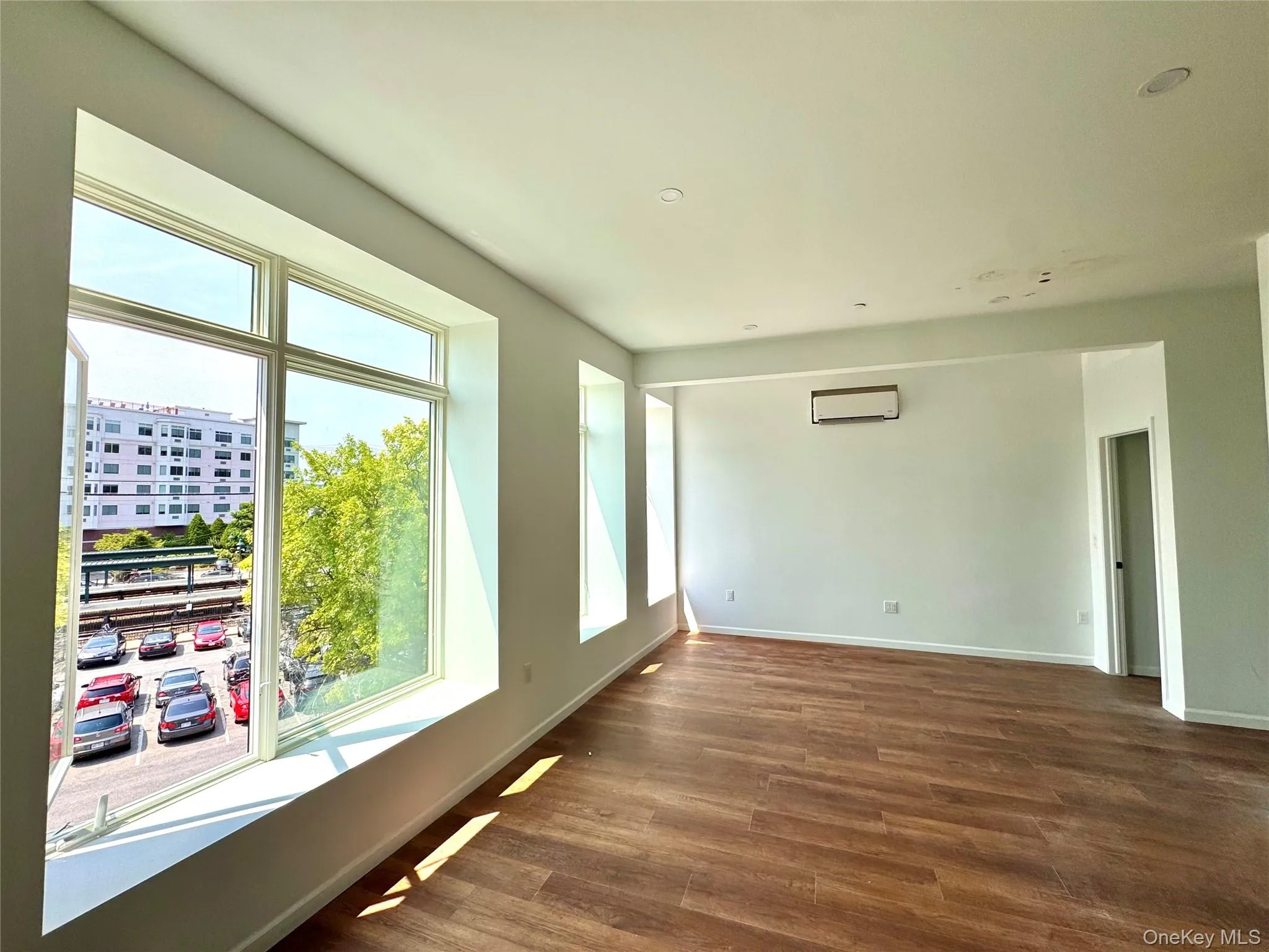 Living Room/Dining Room combo featuring recessed lighting and wood floors Living Room/Dining Room combo featuring recessed lighting and wood floors
