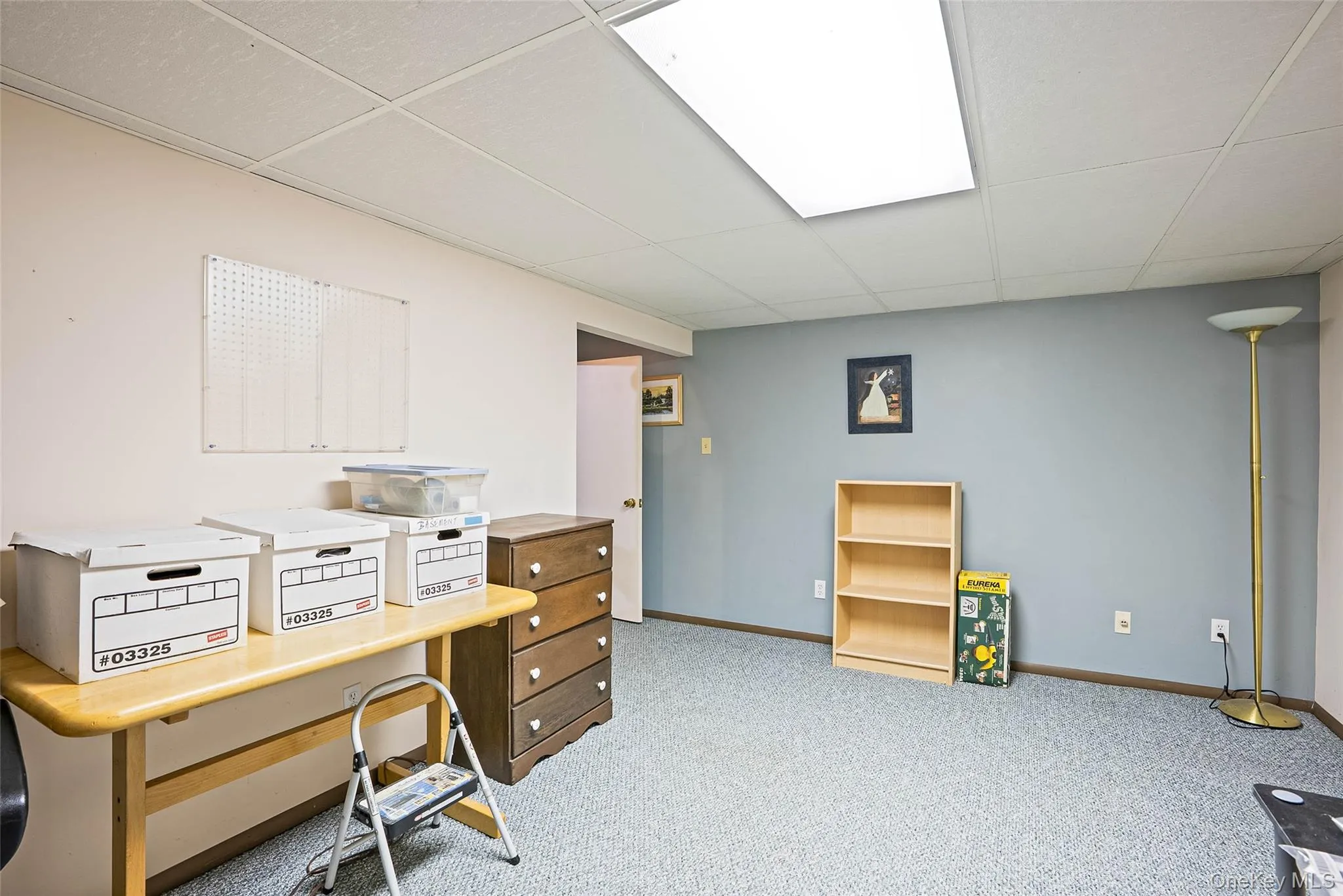 Recessed ceiling lighting within a suspended grid ceiling Recessed ceiling lighting within a suspended grid ceiling