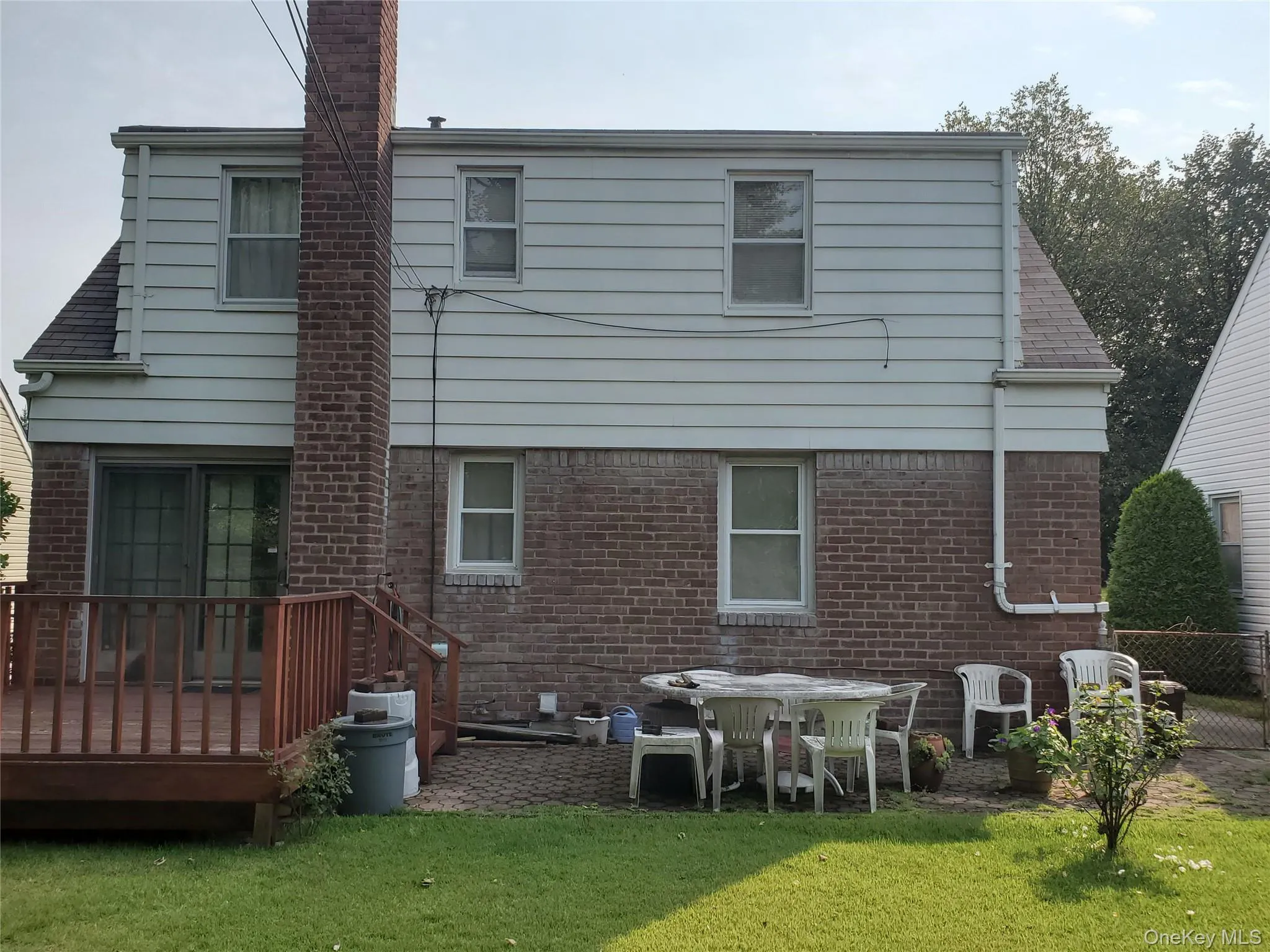 23-32 206th St Bayside. Rear view - wide line Cape Cod style home. 23-32 206th St Bayside. Rear view - wide line Cape Cod style home.
