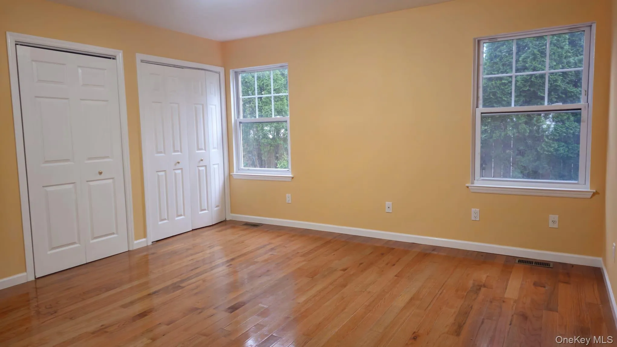 Bedroom 1: primary, spacious, lots of light, and 2 closets Bedroom 1: primary, spacious, lots of light, and 2 closets