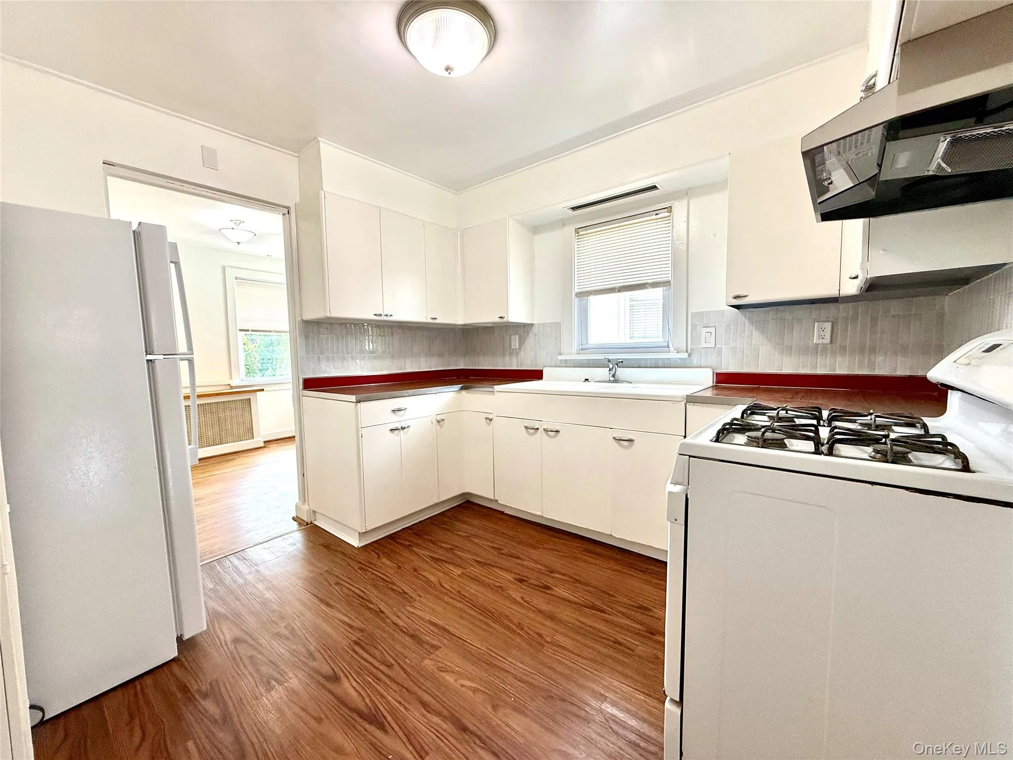 Cute kitchen with adjoining dining nook Cute kitchen with adjoining dining nook