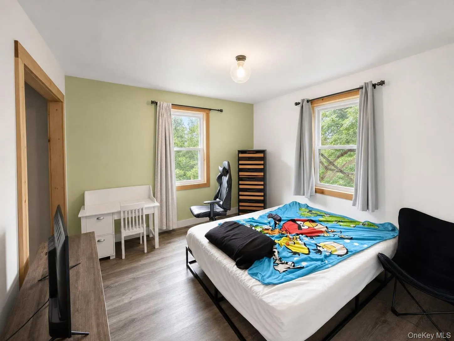 Recessed lighting, wood-finish flooring, and natural wood trim accents Recessed lighting, wood-finish flooring, and natural wood trim accents