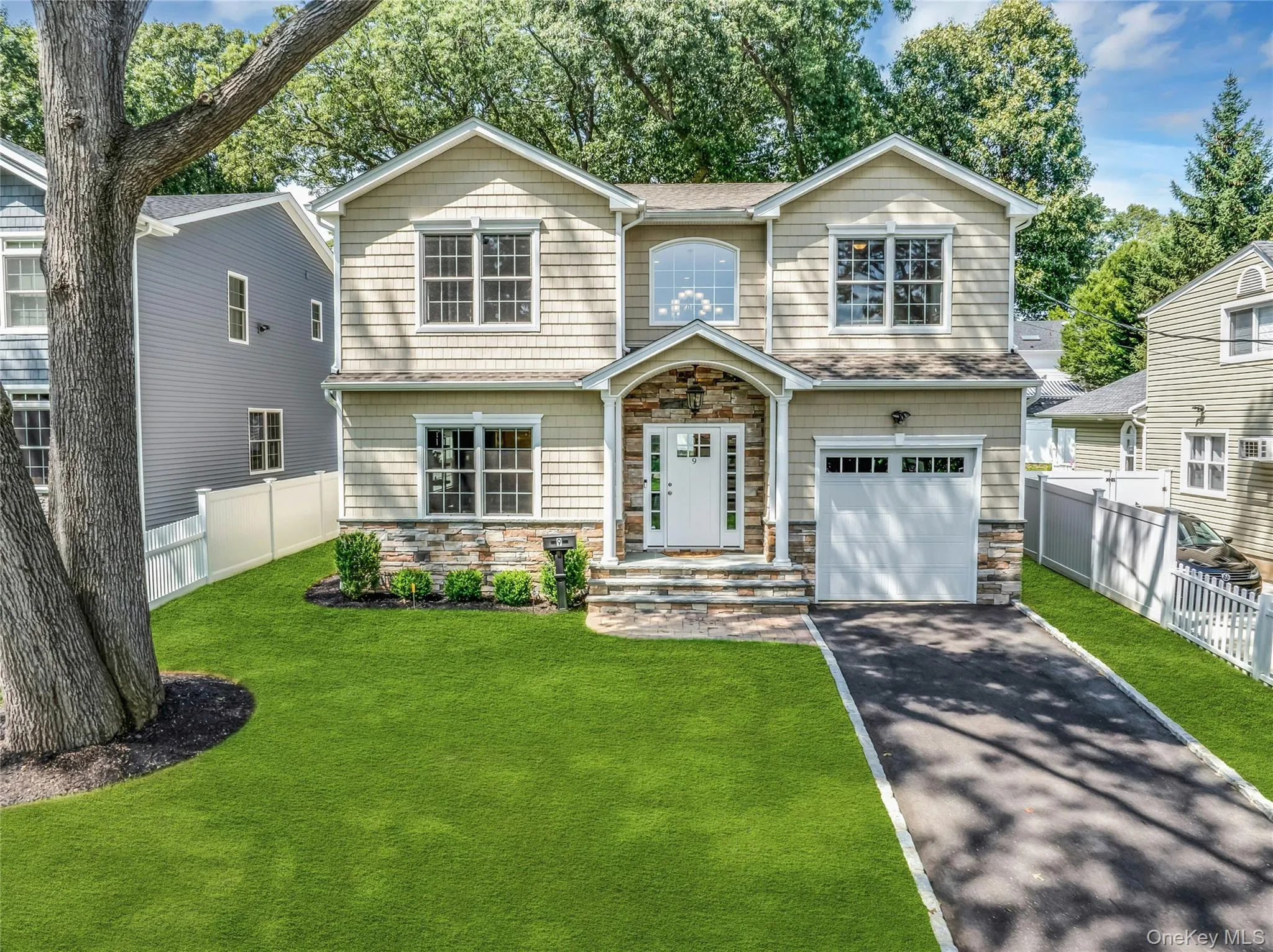 Colonial with one car garage. Colonial with one car garage.