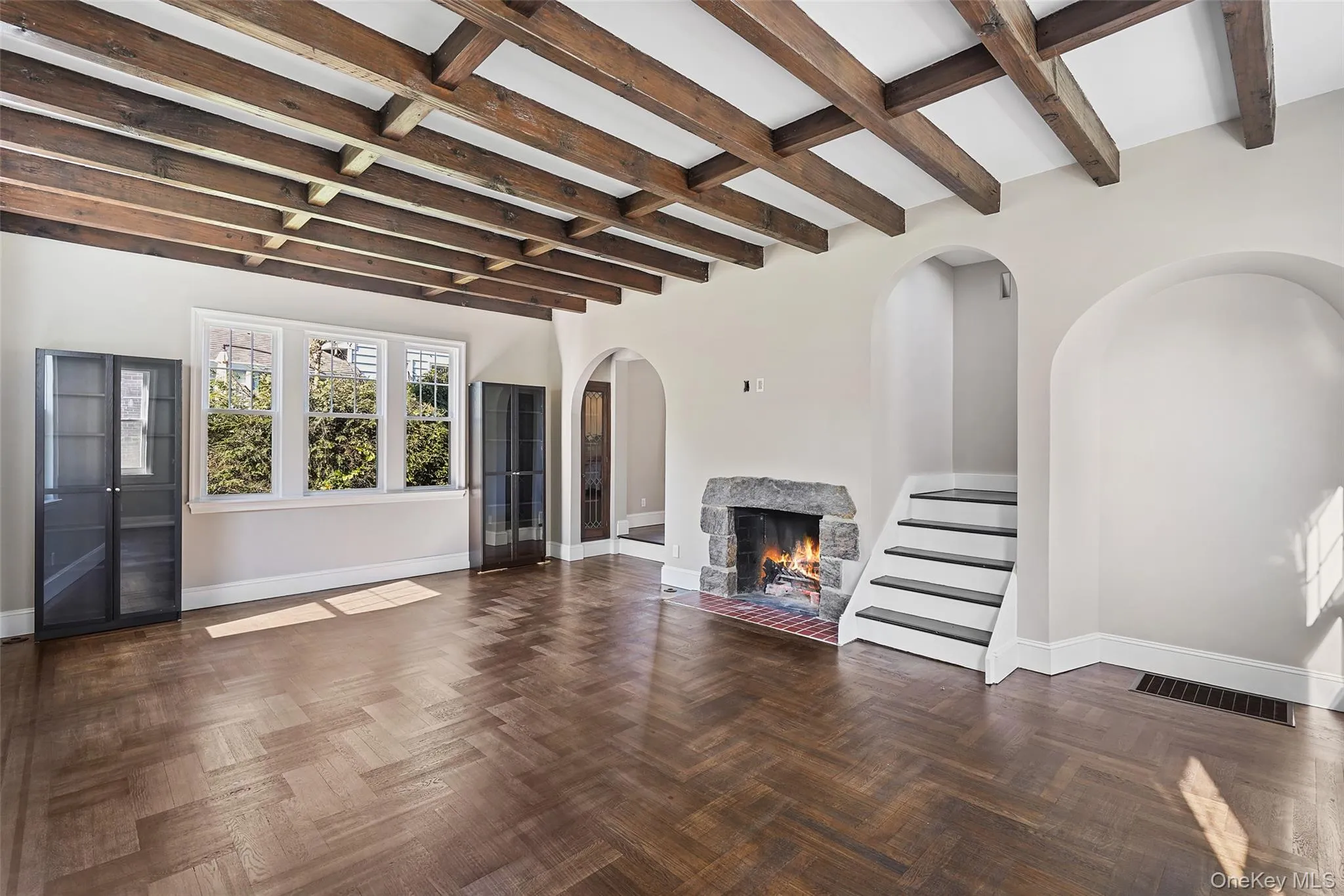 Expansive Living Room with wood-burning fireplace. Expansive Living Room with wood-burning fireplace.