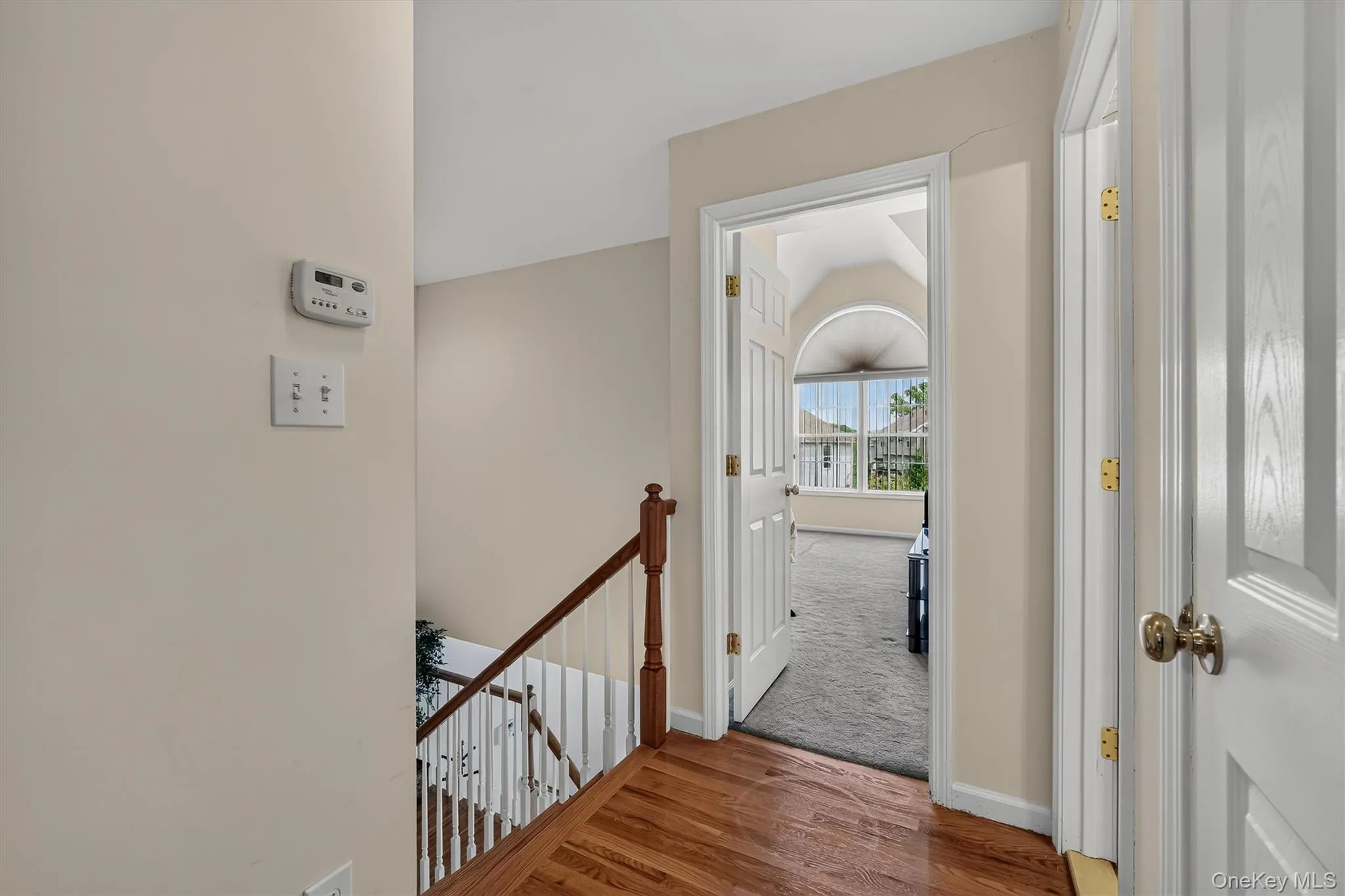 Once up the stairs you will come to the primary suite. Once up the stairs you will come to the primary suite.