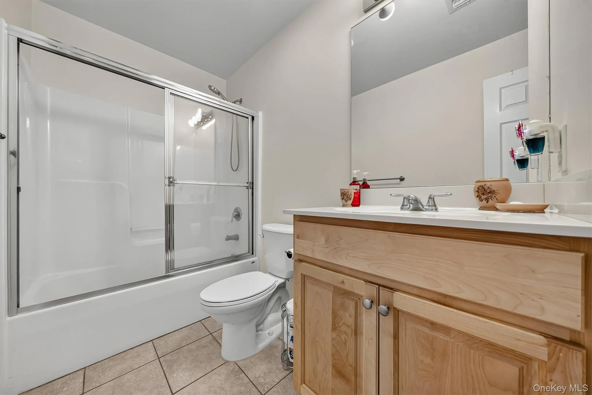 The guest bathroom has a tub/shower. The guest bathroom has a tub/shower.