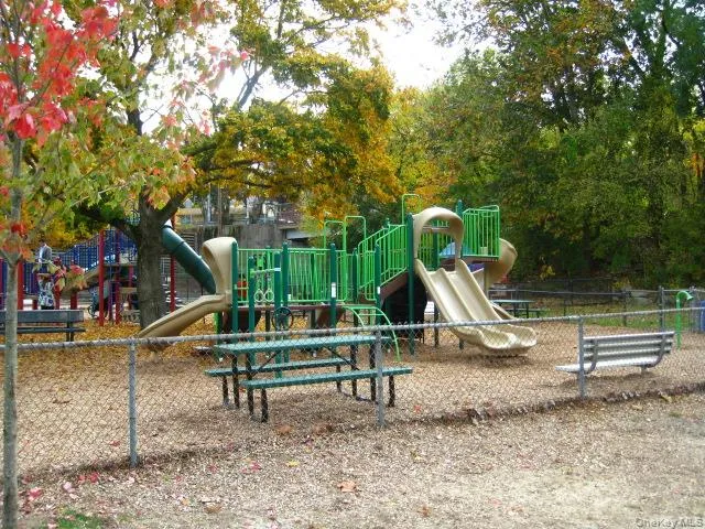 Garth Road Playground - Garth Road is a self contained tree lined street and 1/2 mile long starting at the Scarsdale Metro North Train Station and ending at the ball field. Easy walk to Scarsdale village and train. It's only a 33 minute train ride to Grand Central Terminal. As a resident you are entitled to join the Town’s Lake Isle Park, that features a Par 70, 18 hole golf course, 8 Tennis courts and 5 swimming pools including a 50 meter Olympic Pool with eight racing lanes. Garth Road Playground - Garth Road is a self contained tree lined street and 1/2 mile long starting at the Scarsdale Metro North Train Station and ending at the ball field. Easy walk to Scarsdale village and train. It's only a 33 minute train ride to Grand Central Terminal. As a resident you are entitled to join the Town’s Lake Isle Park, that features a Par 70, 18 hole golf course, 8 Tennis courts and 5 swimming pools including a 50 meter Olympic Pool with eight racing lanes.