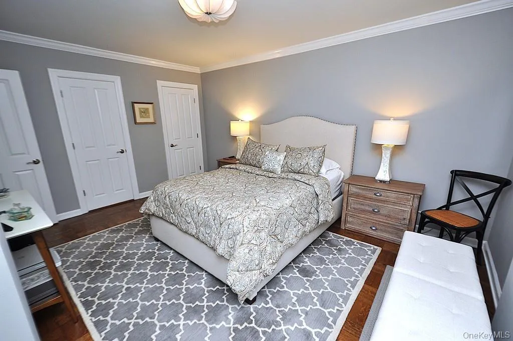 The large bedroom has two closets, a bay window and refinished parquet floors. The bedroom is approx. 15'-4" x 11'-9". The large bedroom has two closets, a bay window and refinished parquet floors. The bedroom is approx. 15'-4" x 11'-9".
