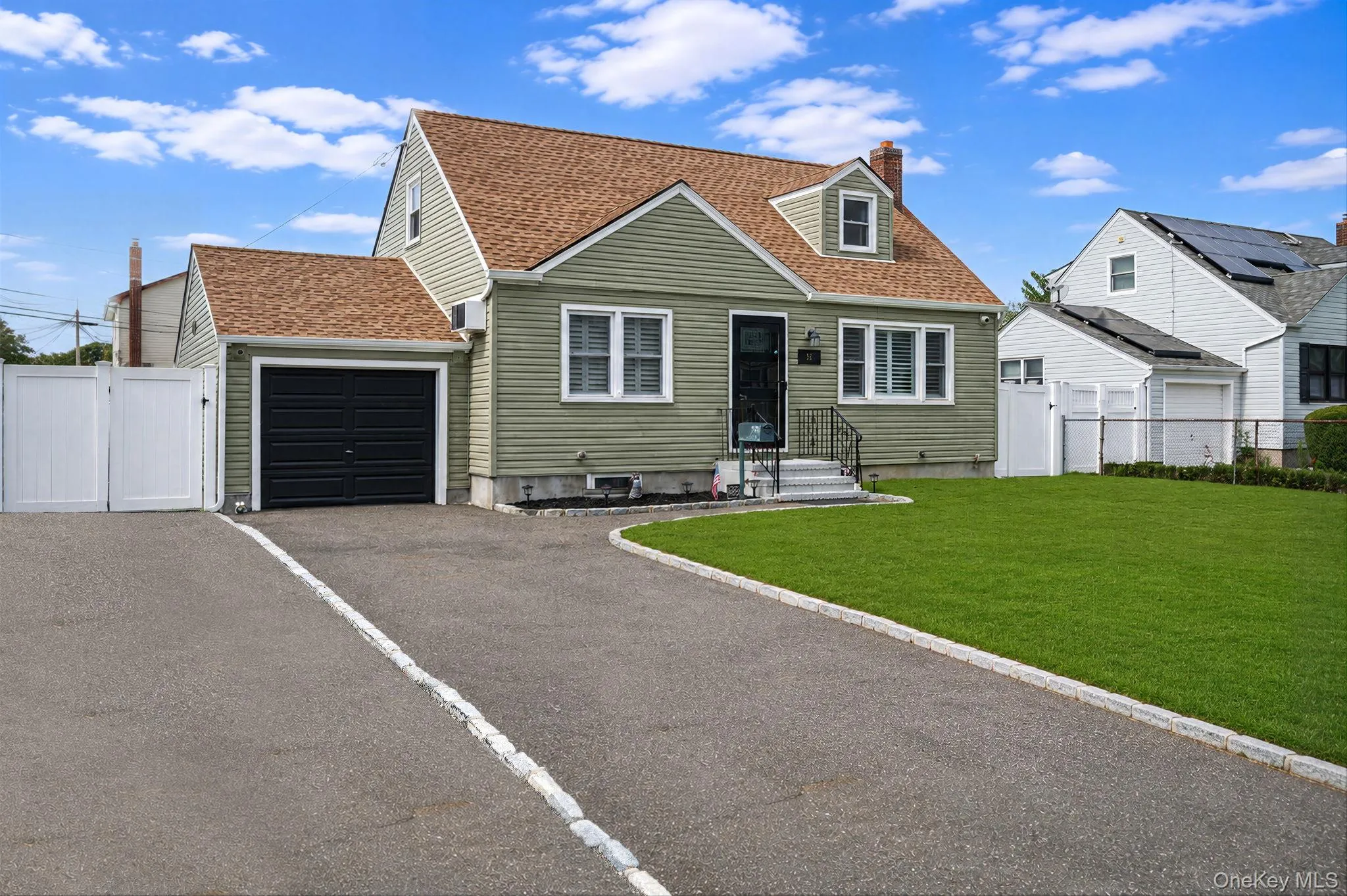 Driveway doubled with Bluestone. Lawn digitally enhanced. Driveway doubled with Bluestone. Lawn digitally enhanced.