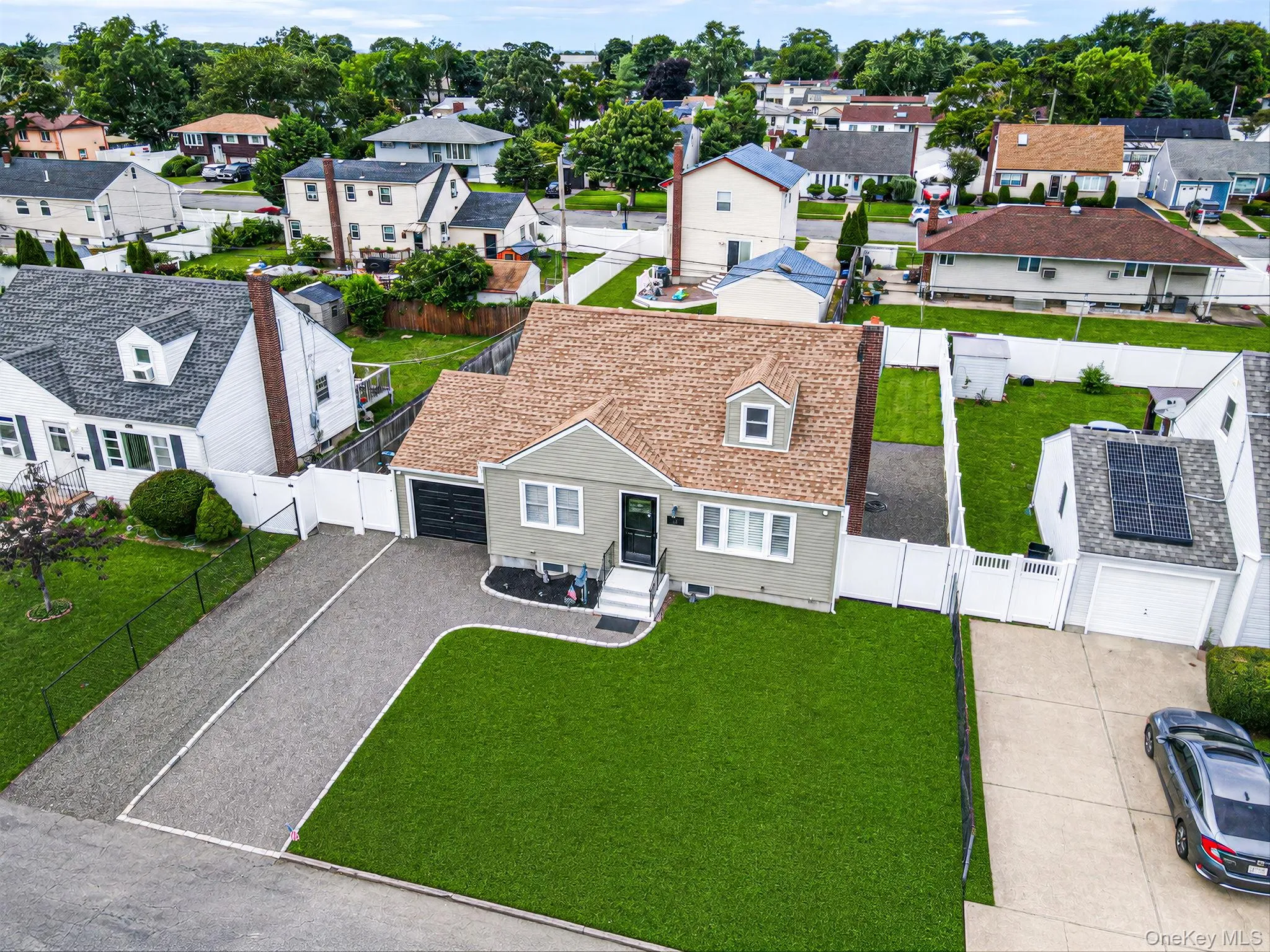 Driveway doubled with Bluestone. Lawn digitally enhanced. Driveway doubled with Bluestone. Lawn digitally enhanced.